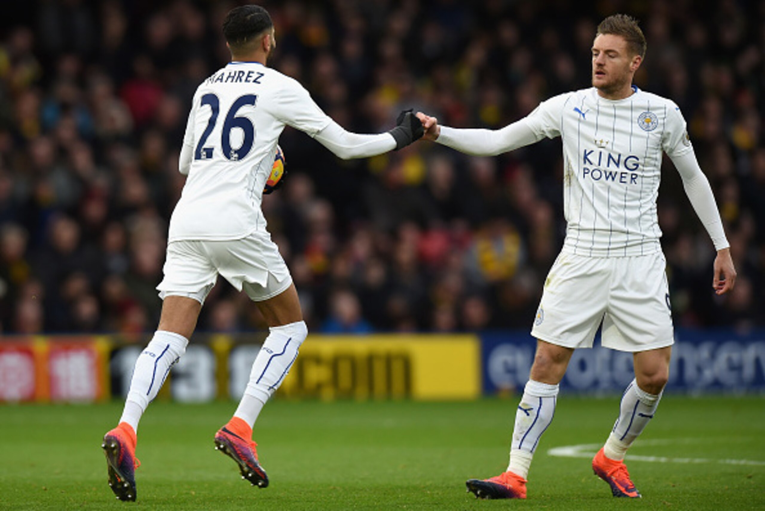 WATFORD, ENGLAND - NOVEMBER 19: Jamie Vardy of Leicester City congratulates Riyad Mahrez of Leicester City on scoring a penalty during the Premier League match between Watford and Leicester City at Vicarage Road on November 19, 2016 in Watford, England. WATFORD, ENGLAND - NOVEMBER 19: Jamie Vardy of Leicester City congratulates Riyad Mahrez of Leicester City on scoring a penalty during the Premier League match between Watford and Leicester City at Vicarage Road on November 19, 2016 in Watford, England.