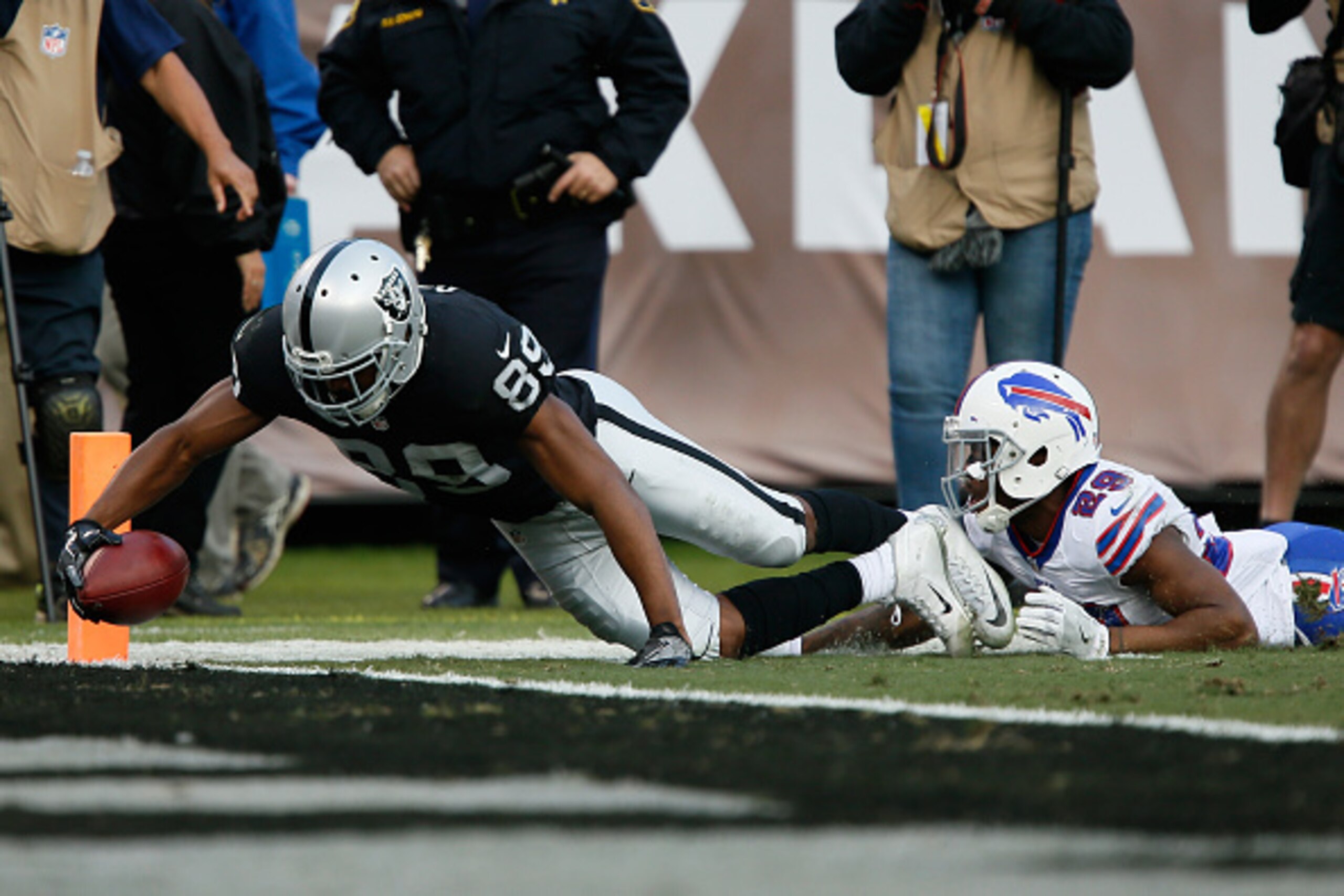 OAKLAND, CA - DECEMBER 04: Amari Cooper #89 of the Oakland Raiders dives into the end zone for a touchdown against the Buffalo Bills during their NFL game at Oakland Alameda Coliseum on December 4, 2016 in Oakland, California. (Photo by Brian Bahr/Getty OAKLAND, CA - DECEMBER 04: Amari Cooper #89 of the Oakland Raiders dives into the end zone for a touchdown against the Buffalo Bills during their NFL game at Oakland Alameda Coliseum on December 4, 2016 in Oakland, California. (Photo by Brian Bahr/Getty