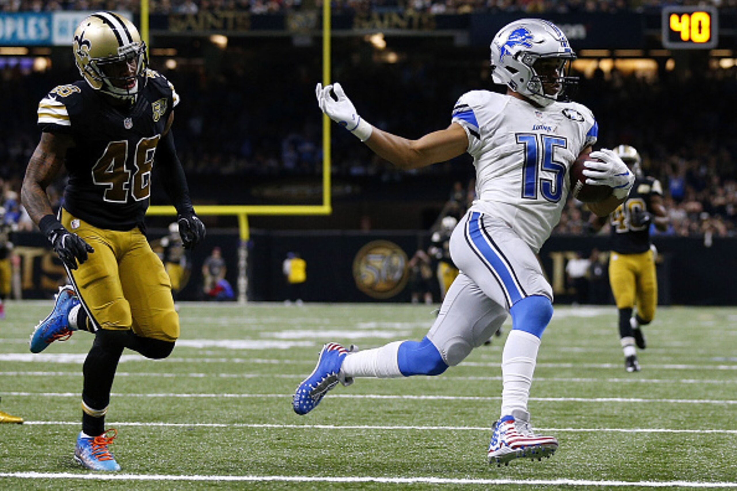 NEW ORLEANS, LA - DECEMBER 04: Golden Tate #15 of the Detroit Lions scores a touchdown as Vonn Bell #48 of the New Orleans Saints defends during the second half of a game at the Mercedes-Benz Superdome on December 4, 2016 in New Orleans, Louisiana. (Phot NEW ORLEANS, LA - DECEMBER 04: Golden Tate #15 of the Detroit Lions scores a touchdown as Vonn Bell #48 of the New Orleans Saints defends during the second half of a game at the Mercedes-Benz Superdome on December 4, 2016 in New Orleans, Louisiana. (Phot
