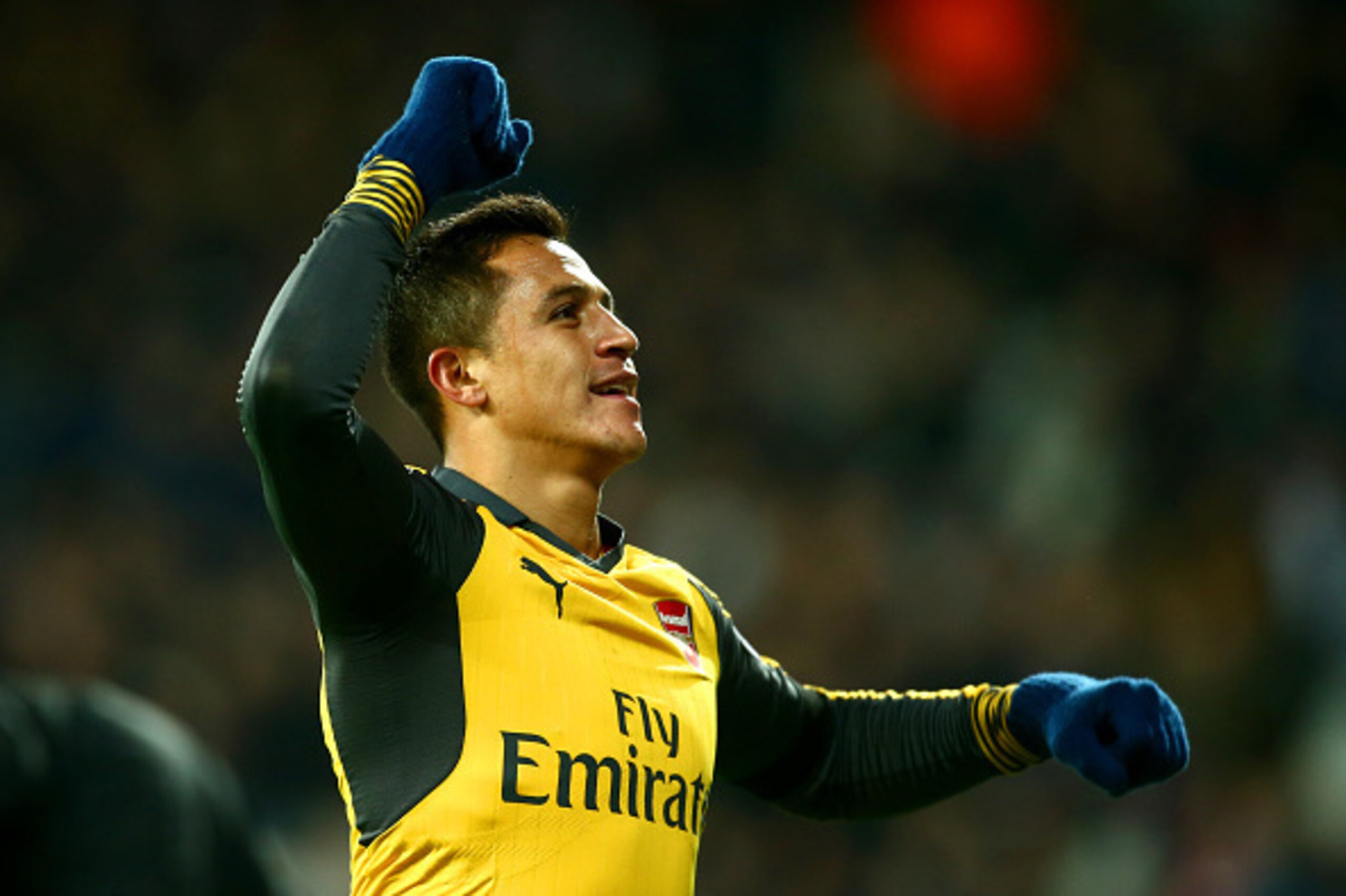 LONDON, ENGLAND - DECEMBER 03:  Alexis Sanchez of Arsenal celebrates after scoring his team's second goal during the Premier League match between West Ham United and Arsenal at London Stadium on December 3, 2016 in London, England.  (Photo by Jordan Mansf