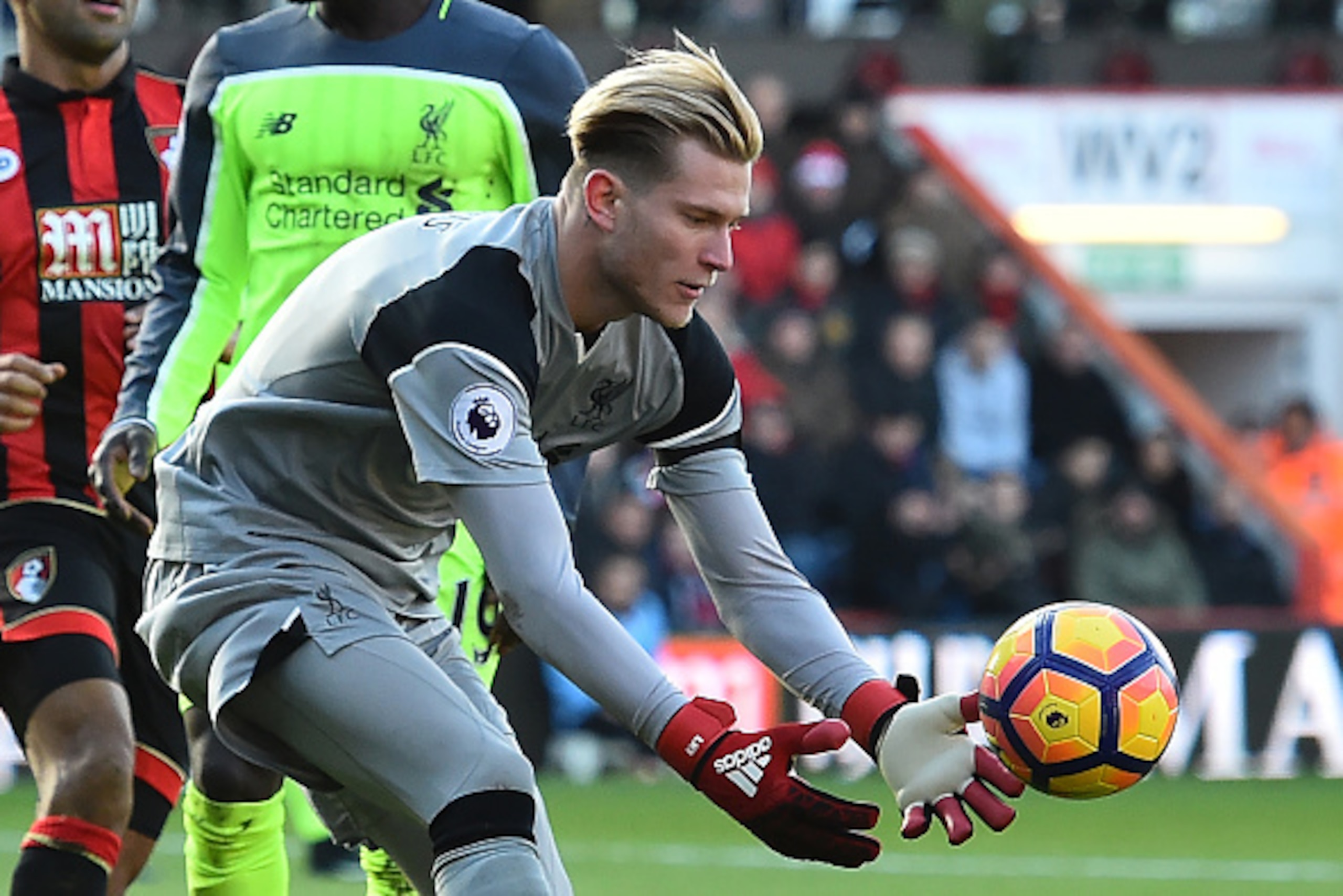 Liverpool's German goalkeeper Loris Karius gathers the ball during the English Premier League football match between Bournemouth and Liverpool at the Vitality Stadium in Bournemouth, southern England on December 4, 2016.
Bournemouth won the game 4-3. / AF