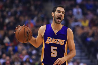 TORONTO, ON - DECEMBER 02:  Jose Calderon #5 of the Los Angeles Lakers dribbles the ball during the first half of an NBA game against the Toronto Raptors at Air Canada Centre on December 2, 2016 in Toronto, Canada.  NOTE TO USER: User expressly acknowledg