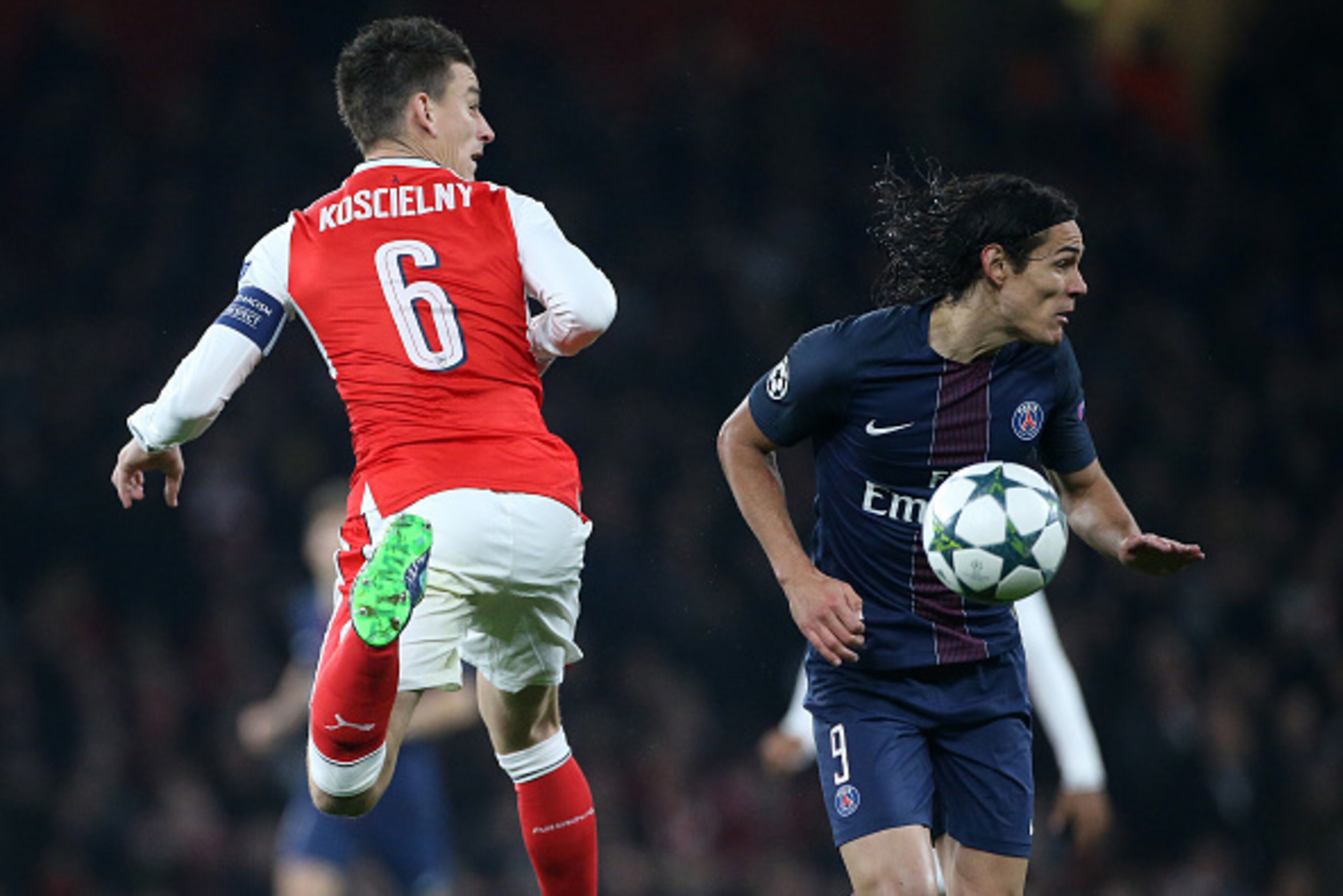 LONDON, ENGLAND - NOVEMBER 23: Laurent Koscielny of Arsenal and Edinson Cavani of PSG in action during the UEFA Champions League match between Arsenal FC and Paris Saint-Germain at Emirates Stadium on November 23, 2016 in London, England. (Photo by Jean C
