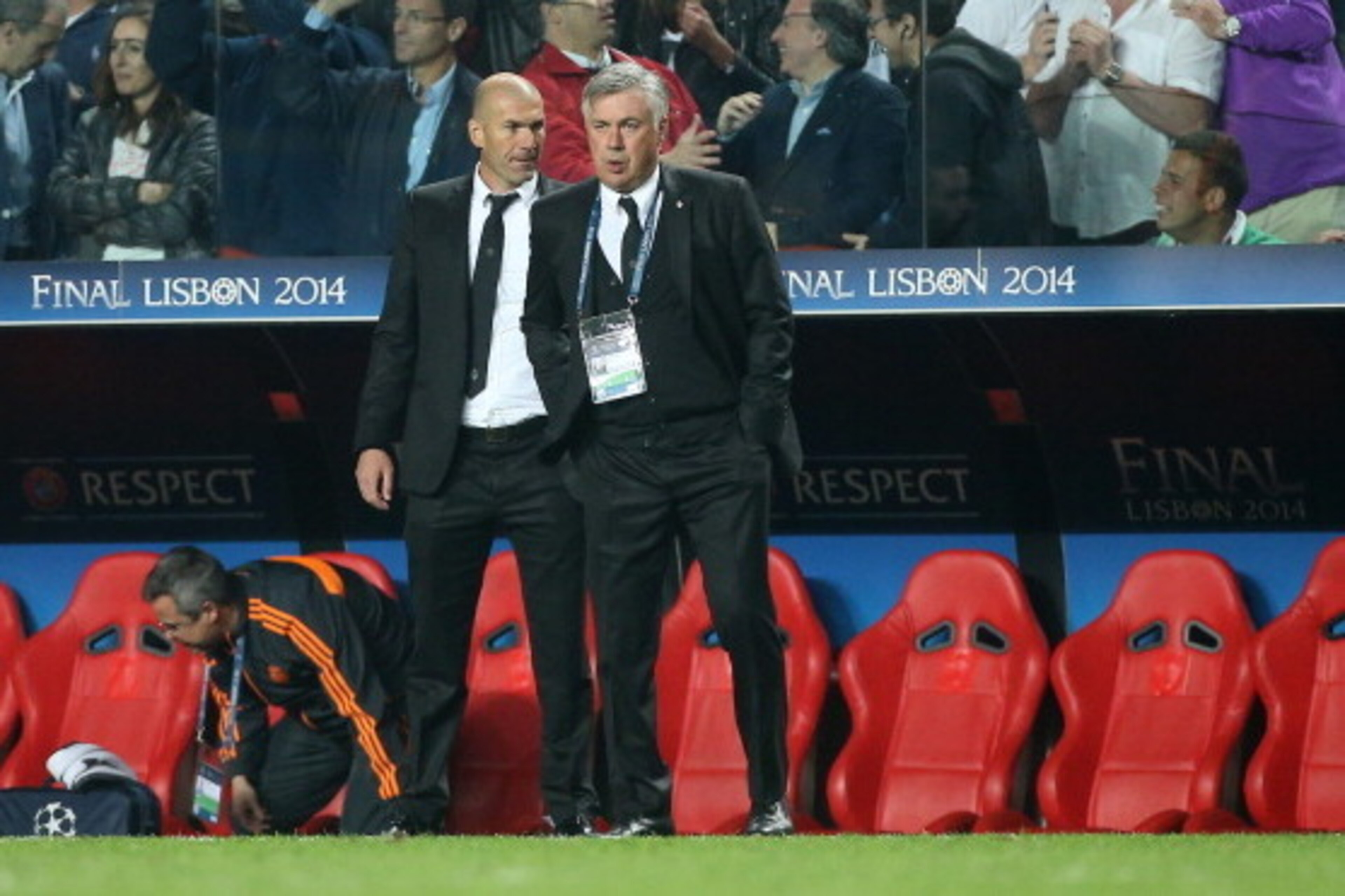 LISBON, PORTUGAL - MAY 24: Coach of Real Madrid Carlo Ancelotti and his assistant-coach Zinedine Zidane look on during the UEFA Champions League final between Real Madrid and Atletico de Madrid at Estadio da Luz stadium on May 24, 2014 in Lisbon, Portugal