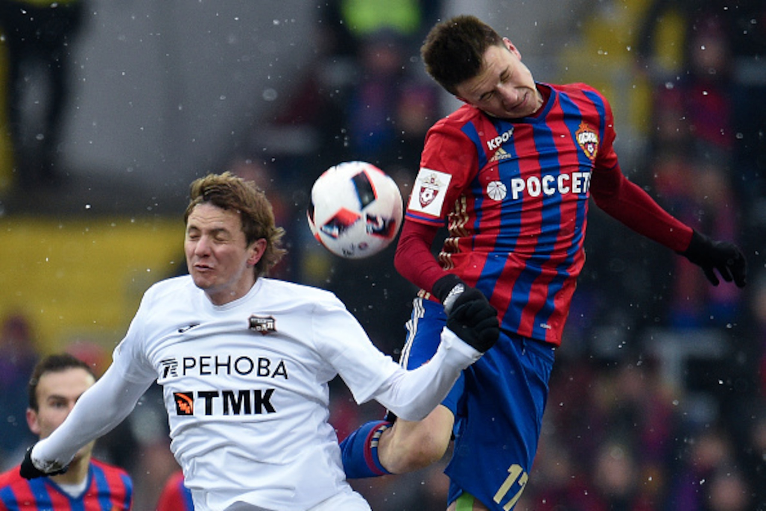 MOSCOW, RUSSIA - DECEMBER 03: Aleksandr Golovin (R) of PFC CSKA Moscow challenged by Roman Pavlyuchenko of FC Ural Ekaterinburg during the Russian Premier League match between PFC CSKA Moscow and FC Ural Ekaterinburg at CSKA Arena Stadium on December 03, 