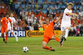 BASEL, SWITZERLAND - JUNE 21:  Roman Pavlyuchenko of Russia shoots and scores his teams first goal of the game during the UEFA EURO 2008 Quarter Final match between Netherlands and Russia at St. Jakob-Park on June 21, 2008 in Basel, Switzerland.  (Photo b