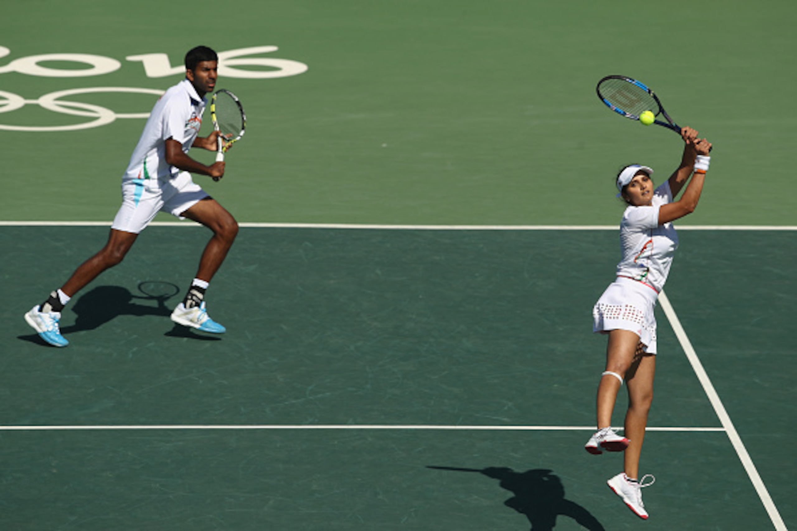 RIO DE JANEIRO, BRAZIL - AUGUST 14: Rohan Bopanna and Sania Mirza of India in action during the mixed doubles bronze medal match against Radek Stepanek and Lucie Hradecka of the Czech Republic on Day 9 of the Rio 2016 Olympic Games at the Olympic Tennis RIO DE JANEIRO, BRAZIL - AUGUST 14: Rohan Bopanna and Sania Mirza of India in action during the mixed doubles bronze medal match against Radek Stepanek and Lucie Hradecka of the Czech Republic on Day 9 of the Rio 2016 Olympic Games at the Olympic Tennis