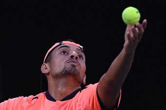 CORRECTION - Nick Kyrgios of Australia serves against Mischa Zverev of Germany during their men's singles match at the Shanghai Masters tennis tournament in Shanghai on October 12, 2016. / AFP / JOHANNES EISELE / The erroneous mention[s] appearing in the 