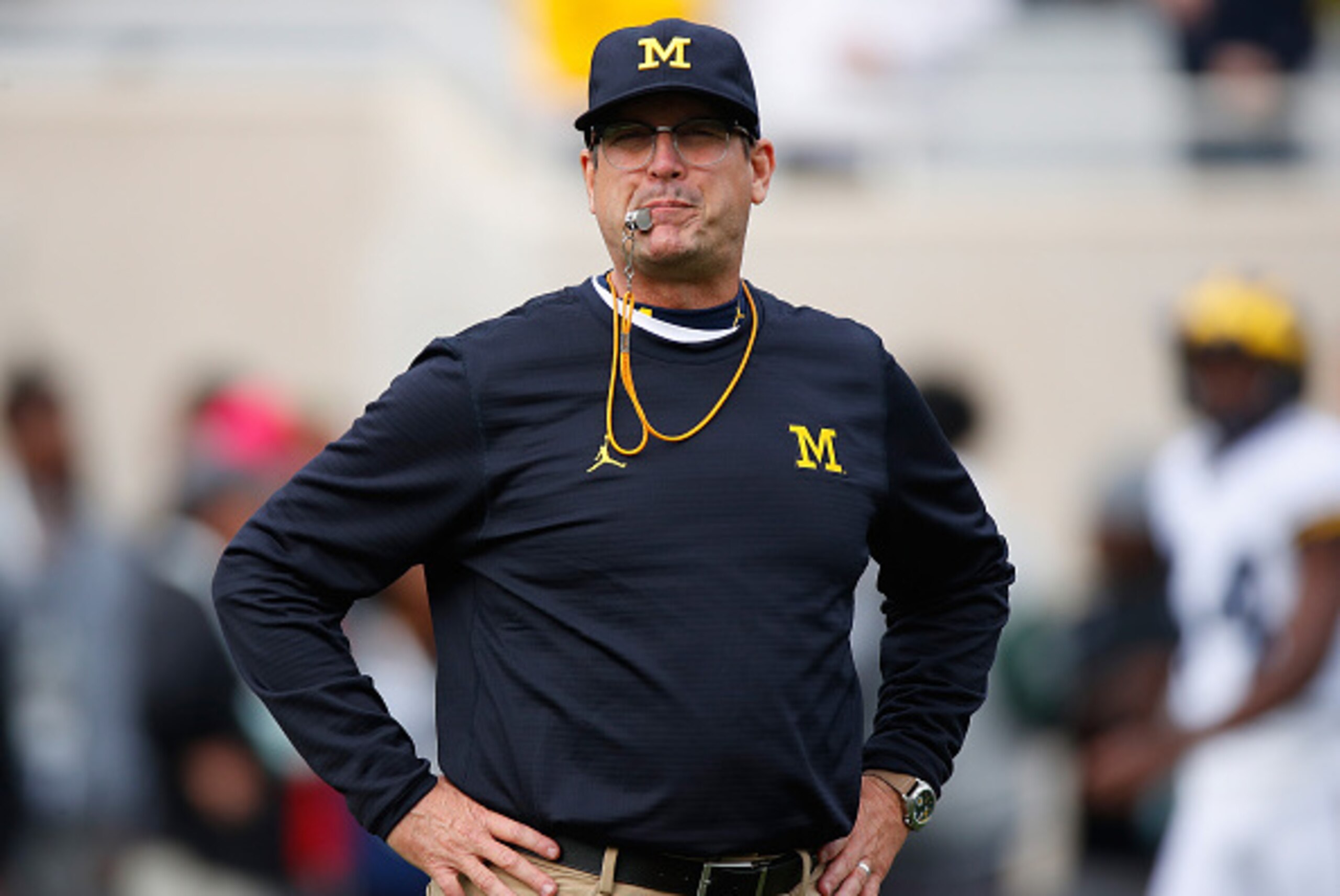 EAST LANSING, MI - OCTOBER 29: Head coach Jim Harbaugh of the Michigan Wolverines looks on during warm ups prior to playing the Michigan State Spartans at Spartan Stadium on October 29, 2016 in East Lansing, Michigan. (Photo by Gregory Shamus/Getty Images EAST LANSING, MI - OCTOBER 29: Head coach Jim Harbaugh of the Michigan Wolverines looks on during warm ups prior to playing the Michigan State Spartans at Spartan Stadium on October 29, 2016 in East Lansing, Michigan. (Photo by Gregory Shamus/Getty Images