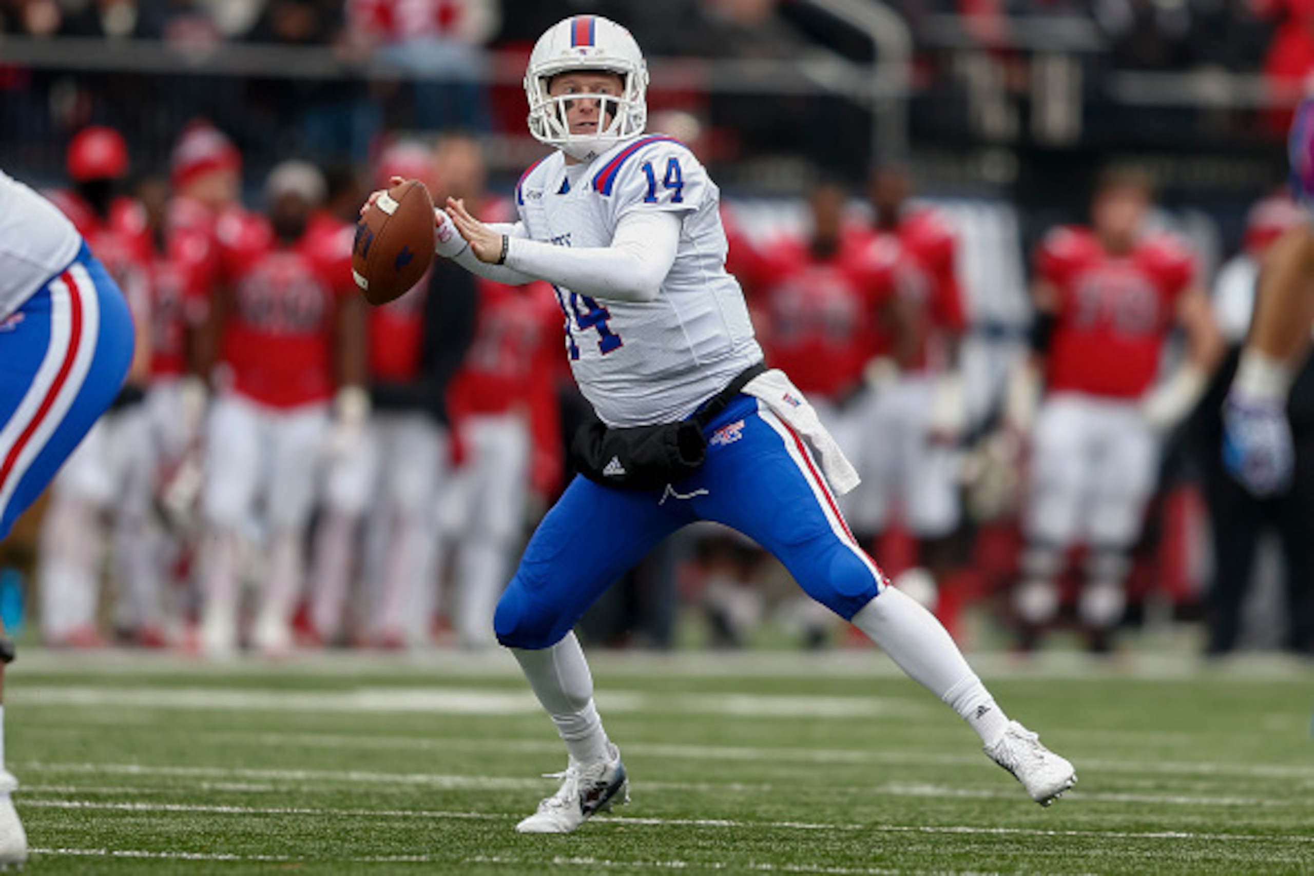 BOWLING GREEN, KY - DECEMBER 03: Ryan Higgins #14 of the Louisiana Tech Bulldogs drops back to pass during the game against the Western Kentucky Hilltoppers at Houchens-Smith Stadium on December 3, 2016 in Bowling Green, Kentucky. Western Kentucky defeate BOWLING GREEN, KY - DECEMBER 03: Ryan Higgins #14 of the Louisiana Tech Bulldogs drops back to pass during the game against the Western Kentucky Hilltoppers at Houchens-Smith Stadium on December 3, 2016 in Bowling Green, Kentucky. Western Kentucky defeate