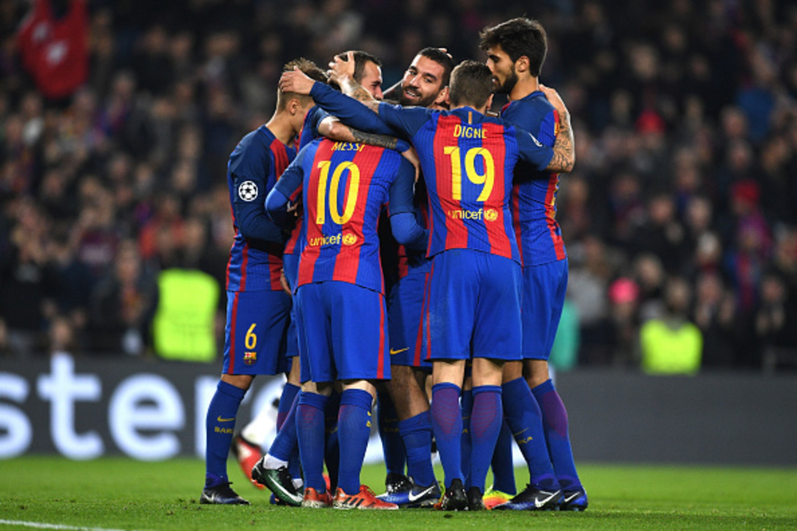 BARCELONA, SPAIN - DECEMBER 06:  Arda Turan of Barcelona (C) celebrates with team mates as he scores their third goal during the UEFA Champions League Group C match between FC Barcelona and VfL Borussia Moenchengladbach at Camp Nou on December 6, 2016 in 