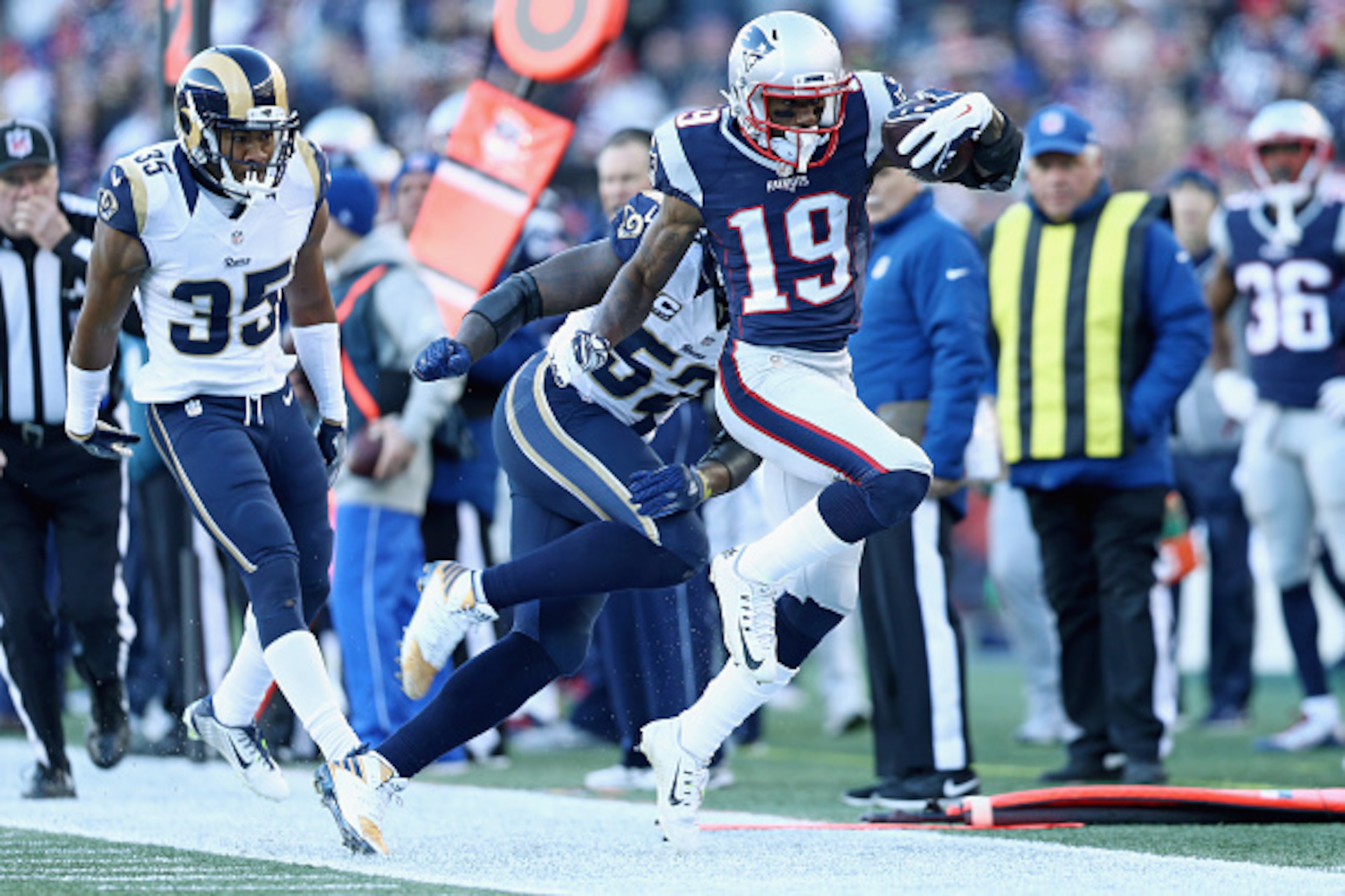 FOXBORO, MA - DECEMBER 04:  Malcolm Mitchell #19 of the New England Patriots carries the ball against the Los Angeles Rams  at Gillette Stadium on December 4, 2016 in Foxboro, Massachusetts.  (Photo by Maddie Meyer/Getty Images)