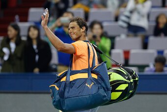 SHANGHAI, CHINA - OCTOBER 12:  Rafael Nadal of Spain leaves the court after losing to Viktor Troicki of Serbia during the Men's singles second round match on day four of Shanghai Rolex Masters at Qi Zhong Tennis Centre on October 12, 2016 in Shanghai, Chi