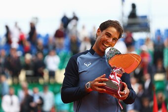 MONTE-CARLO, MONACO - APRIL 17:  Rafael Nadal of Spain celebrates with the trophy after victory in the singles final match against Gael Monfils of France during day eight of the  Monte Carlo Rolex Masters at Monte-Carlo Sporting Club on April 17, 2016 in 