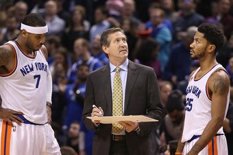 TORONTO, ON - NOVEMBER 12: Head coach Jeff Hornacek of the New York Knicks draws up a play as Carmelo Anthony #7 and Derrick Rose #25 look on during NBA game action against the Toronto Raptors at Air Canada Centre on November 12, 2016 in Toronto, Canada. 