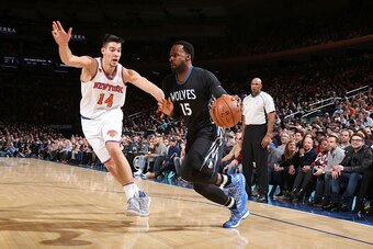 NEW YORK, NY - DECEMBER 2:  Shabazz Muhammad #15 of the Minnesota Timberwolves handles the ball against Willy Hernangomez #14 of the New York Knicks during a game on December 2, 2016 at Madison Square Garden in New York City, New York. NOTE TO USER: User 
