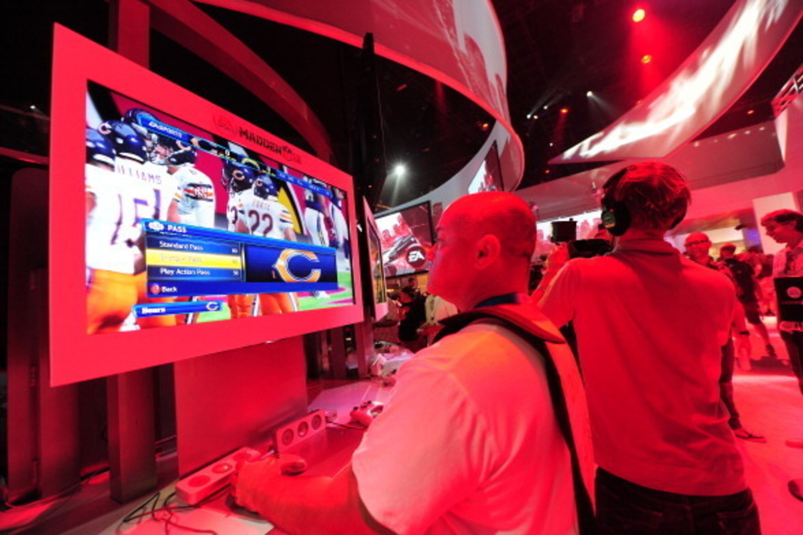 Gaming fans sample EA Sports Madden NFL 13 game on the second day of the E3 videogame extravaganza in Los Angeles on June 6, 2012 in California, where sequels to blockbuster console titles and play on smartphones or tablets are being showcased with Times 