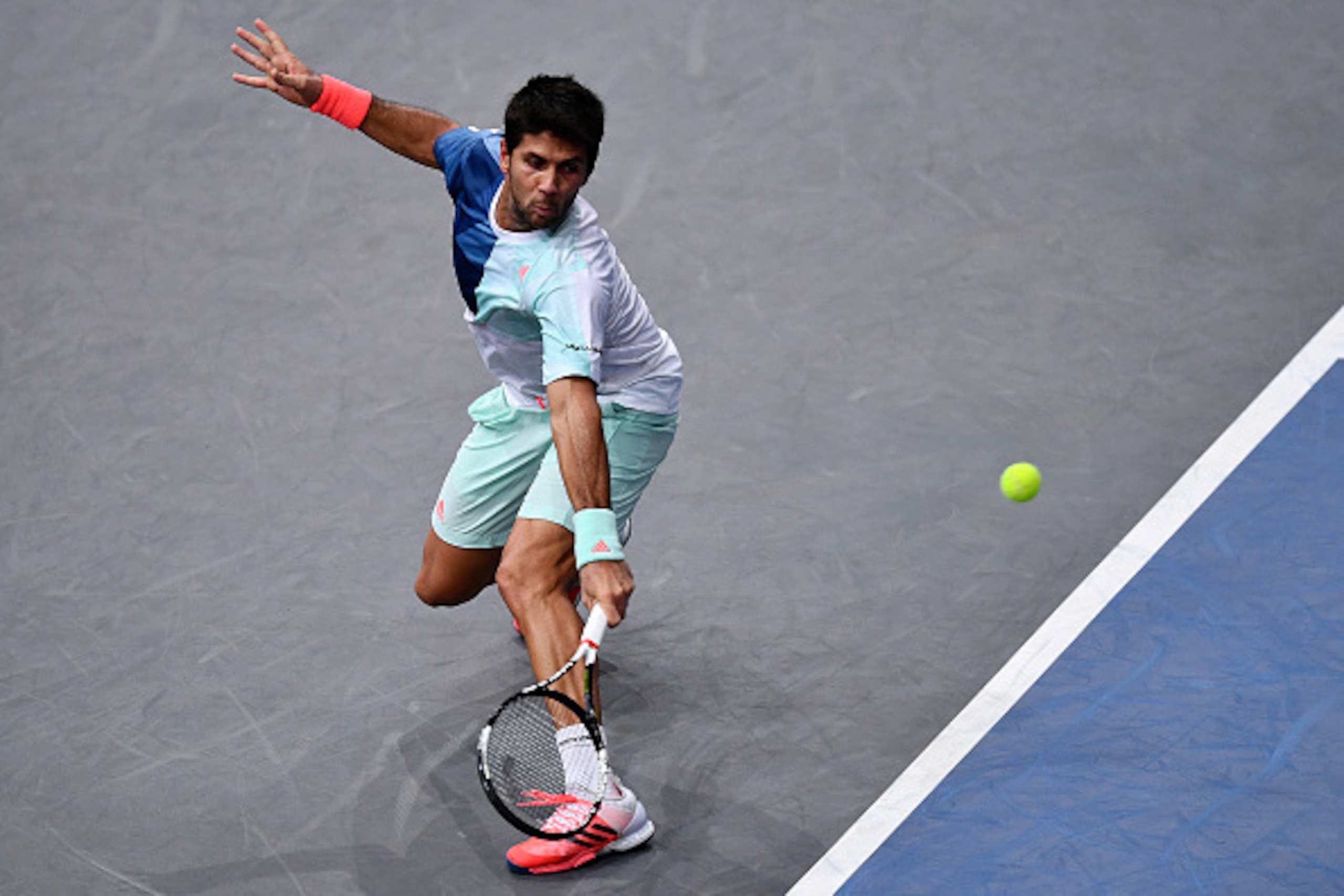PARIS, FRANCE - NOVEMBER 02:  Fernando Verdasco of Spain plays a backhand against Andy Murray of Great Britain during the Mens Singles second round match on day three of the BNP Paribas Masters at Palais Omnisports de Bercy on November 2, 2016 in Paris, F
