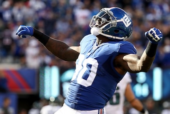 EAST RUTHERFORD, NJ - NOVEMBER 06:  Jason Pierre-Paul #90 of the New York Giants reacts after a play against the Philadelphia Eagles during the first half of the game at MetLife Stadium on November 6, 2016 in East Rutherford, New Jersey.  (Photo by Al Bel