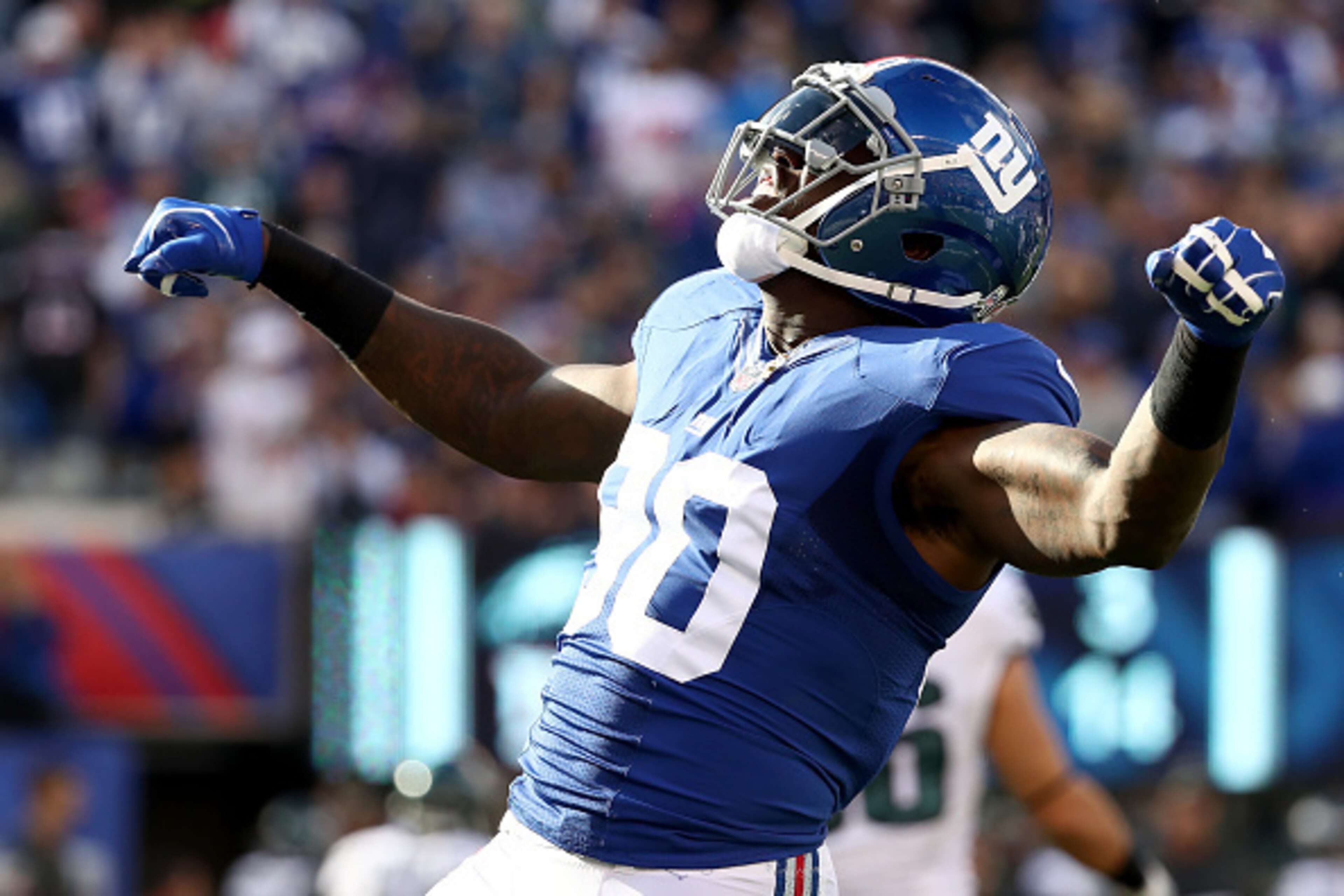 EAST RUTHERFORD, NJ - NOVEMBER 06:  Jason Pierre-Paul #90 of the New York Giants reacts after a play against the Philadelphia Eagles during the first half of the game at MetLife Stadium on November 6, 2016 in East Rutherford, New Jersey.  (Photo by Al Bel