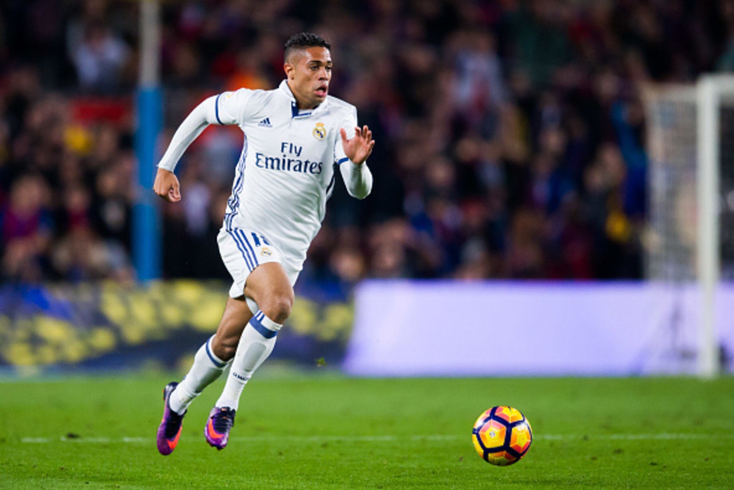 BARCELONA, SPAIN - DECEMBER 03:  Mariano of Real Madrid CF conducts the ball during the La Liga match between FC Barcelona and Real Madrid CF at Camp Nou stadium on December 3, 2016 in Barcelona, Spain.  (Photo by Alex Caparros/Getty Images)