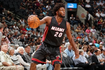 SAN ANTONIO, TX - OCTOBER 14:  Justise Winslow #20 of the Miami Heat drives to the basket against the San Antonio Spurs on October 14, 2016 at AT&T Center in San Antonio, Texas. NOTE TO USER: User expressly acknowledges and agrees that, by downloading and