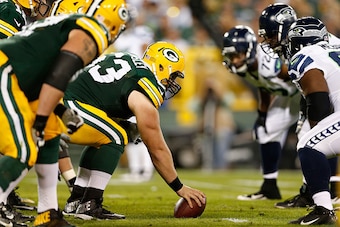 GREEN BAY, WI - SEPTEMBER 20:  Center Corey Linsley #63 of the Green Bay Packers prepares to snap the football against the Seattle Seahawks during the NFL game at Lambeau Field on September 20, 2015 in Green Bay, Wisconsin.  (Photo by Christian Petersen/G