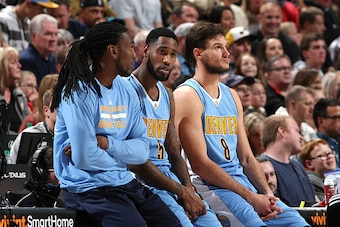SALT LAKE CITY, UT - DECEMBER 3: Kenneth Faried #35, Will Barton #5 and Danilo Gallinari #8 of the Denver Nuggets wait to get called in during the game against the Utah Jazz on December 3, 2016 at EnergySolutions Arena in Salt Lake City, Utah. NOTE TO USE