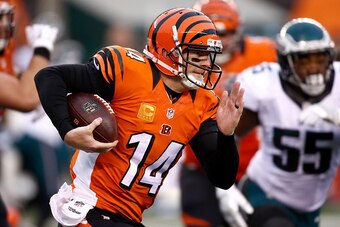 CINCINNATI, OH - DECEMBER 4:  Andy Dalton #14 of the Cincinnati Bengals carries the ball during the third quarter of the game against the Philadelphia Eagles at Paul Brown Stadium on December 4, 2016 in Cincinnati, Ohio. (Photo by Gregory Shamus/Getty Ima