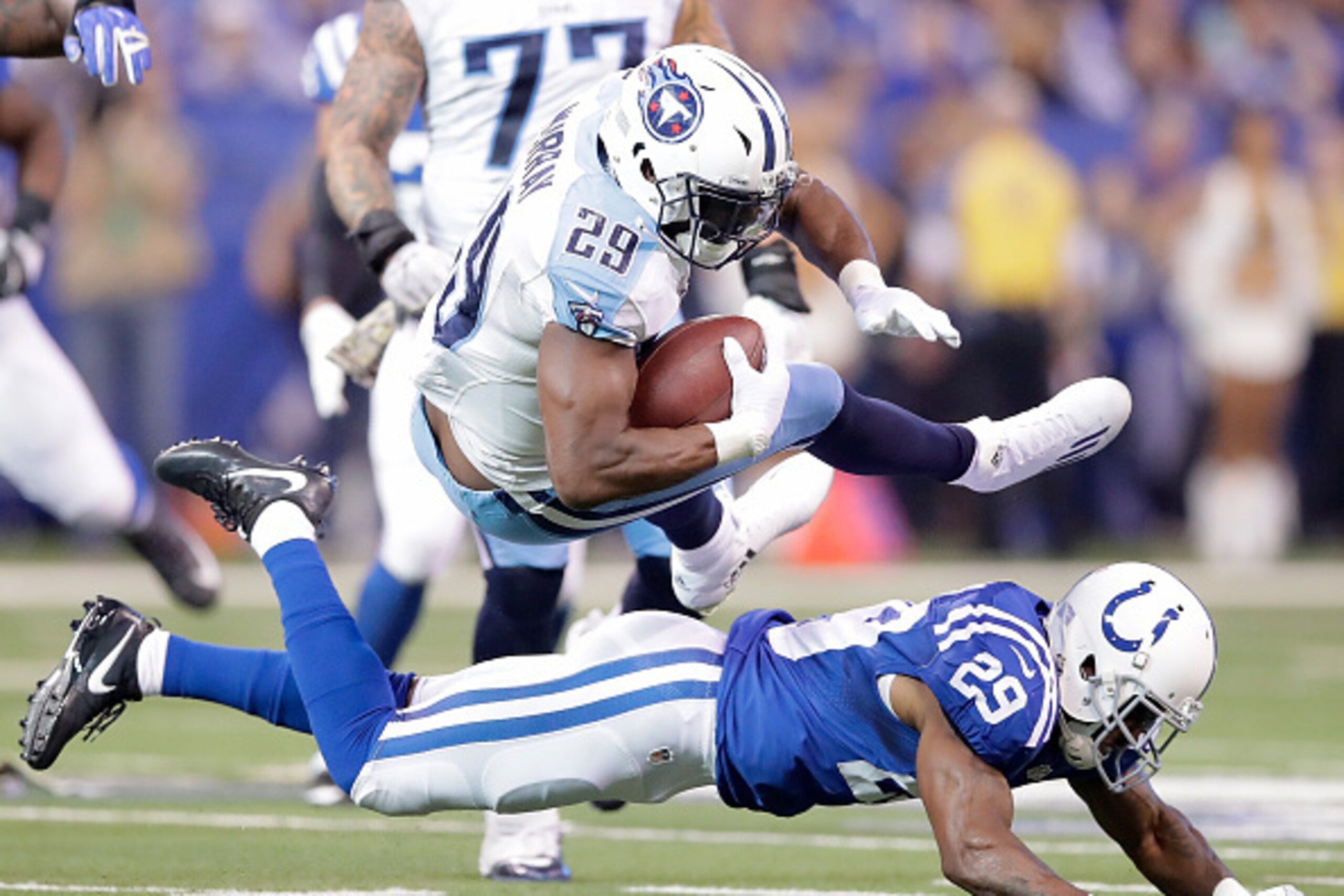 INDIANAPOLIS, IN - NOVEMBER 20:  DeMarco Murray #29 of the Tennessee Titans jumps over Mike Adams #29 of the Indianapolis Colts during the second half of the game at Lucas Oil Stadium on November 20, 2016 in Indianapolis, Indiana.  (Photo by Andy Lyons/Ge