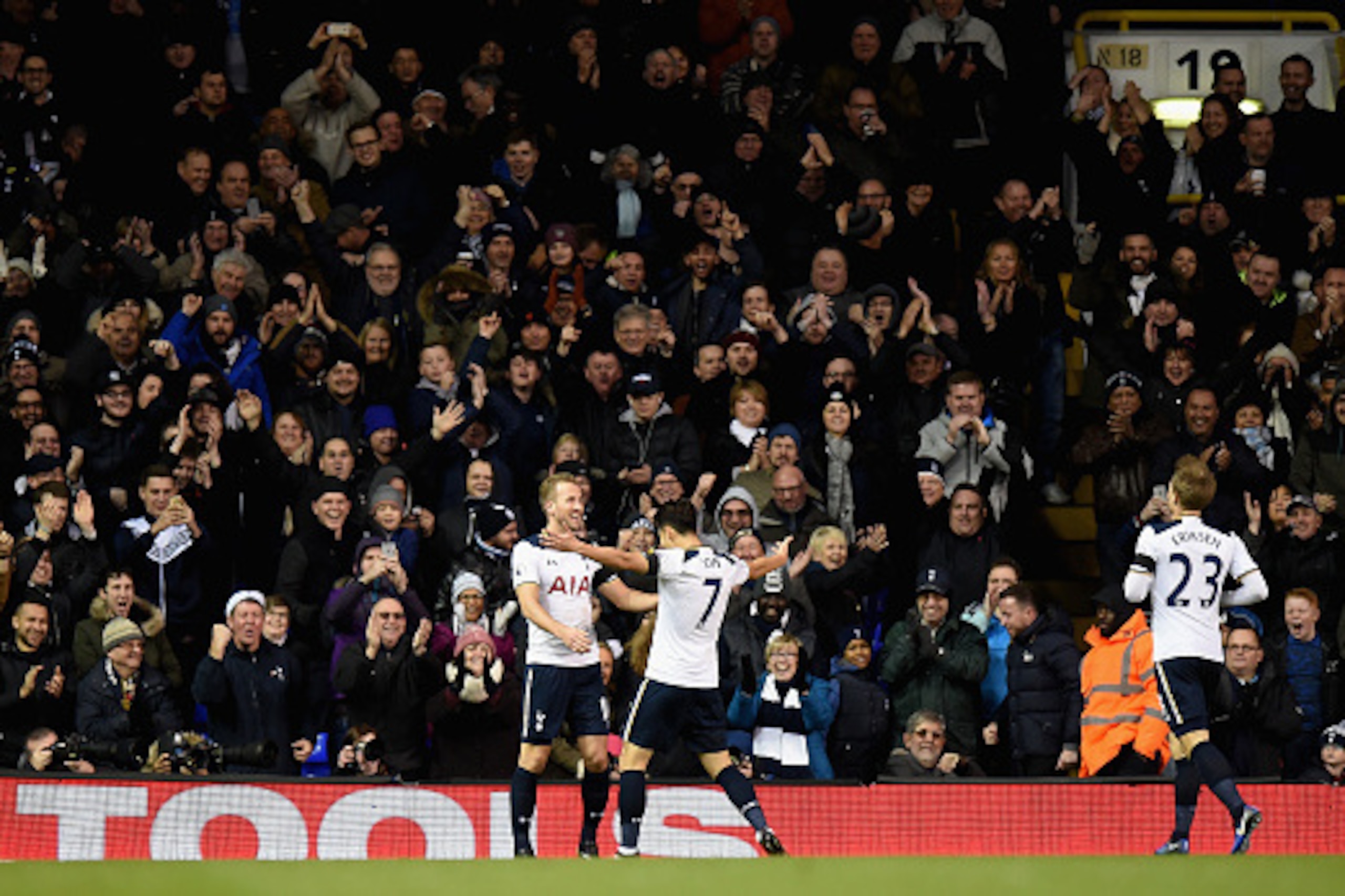 LONDON, ENGLAND - DECEMBER 03: Harry Kane of Tottenham Hotspur celebrates scoring his second goal of the match with Heung-Min Son of Tottenham Hotspur during the Premier League match between Tottenham Hotspur and Swansea City at White Hart Lane on Decembe