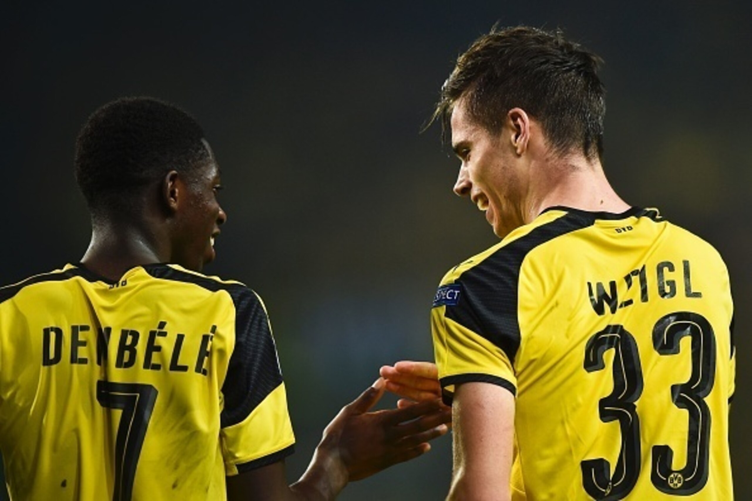 Dortmund's midfielder Julian Weigl (R) celebrates with his teammate Dortmund's French forward Ousmane Dembele (L) after scoring during the UEFA Champions League football match Sporting CP vs BVB Borussia Dortmund at the Jose Alvalade stadium in Lisbon on Dortmund's midfielder Julian Weigl (R) celebrates with his teammate Dortmund's French forward Ousmane Dembele (L) after scoring during the UEFA Champions League football match Sporting CP vs BVB Borussia Dortmund at the Jose Alvalade stadium in Lisbon on
