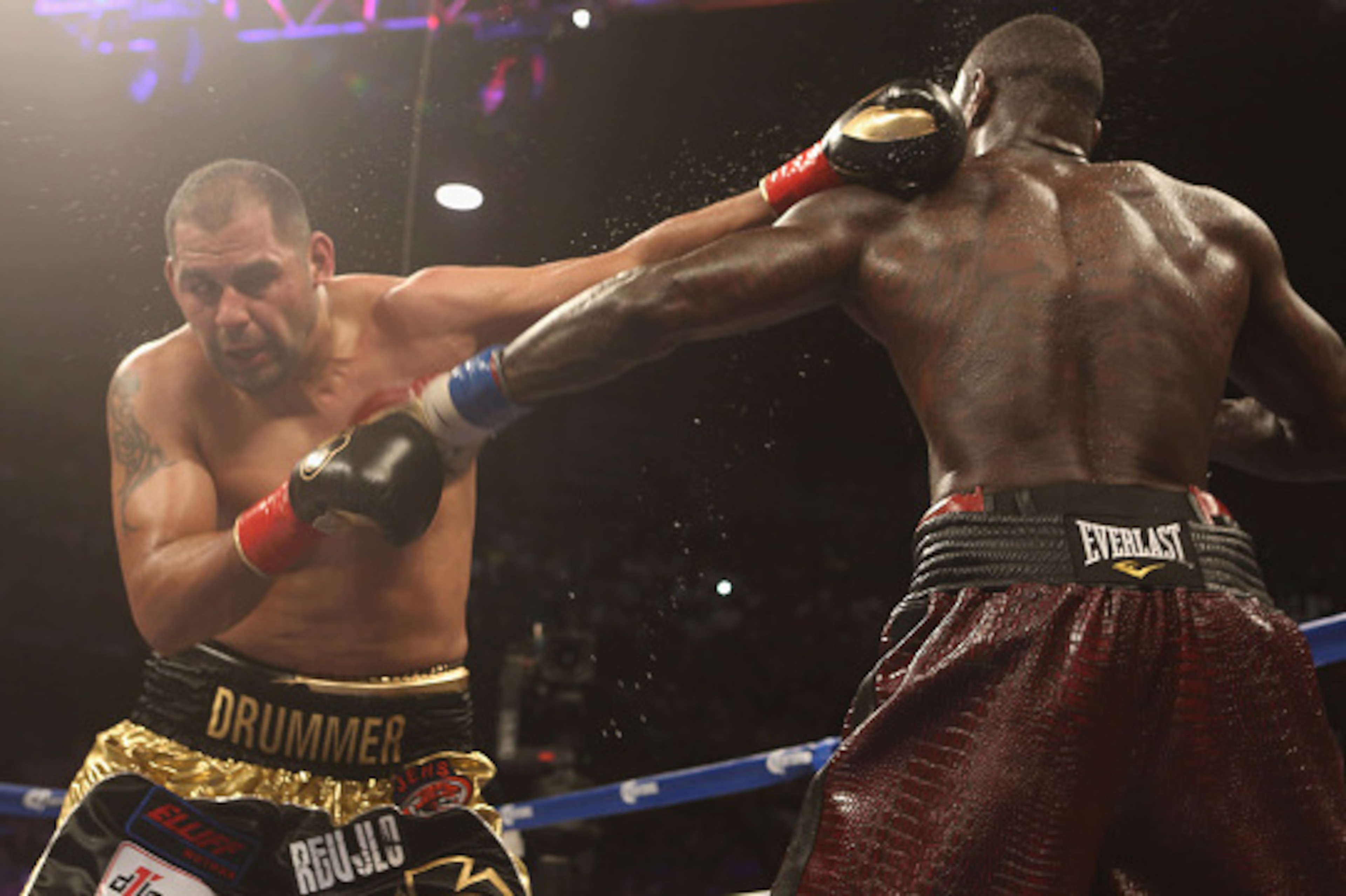 BIRMINGHAM, AL - JUNE 13: Eric Molina throws a punch to WBC World Heavyweight Champion Deontay Wilder at the Bartow Arena on June 13, 2015 in Birmingham, Alabama. (Photo by David A. Smith/Getty Images)