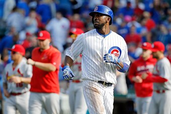 CHICAGO, IL - SEPTEMBER 24: Dexter Fowler #24 of the Chicago Cubs watches the replay after flying out for the final out of the game in their loss to the St. Louis Cardinals at Wrigley Field on September 24, 2016 in Chicago, Illinois. The St. Louis Cardina