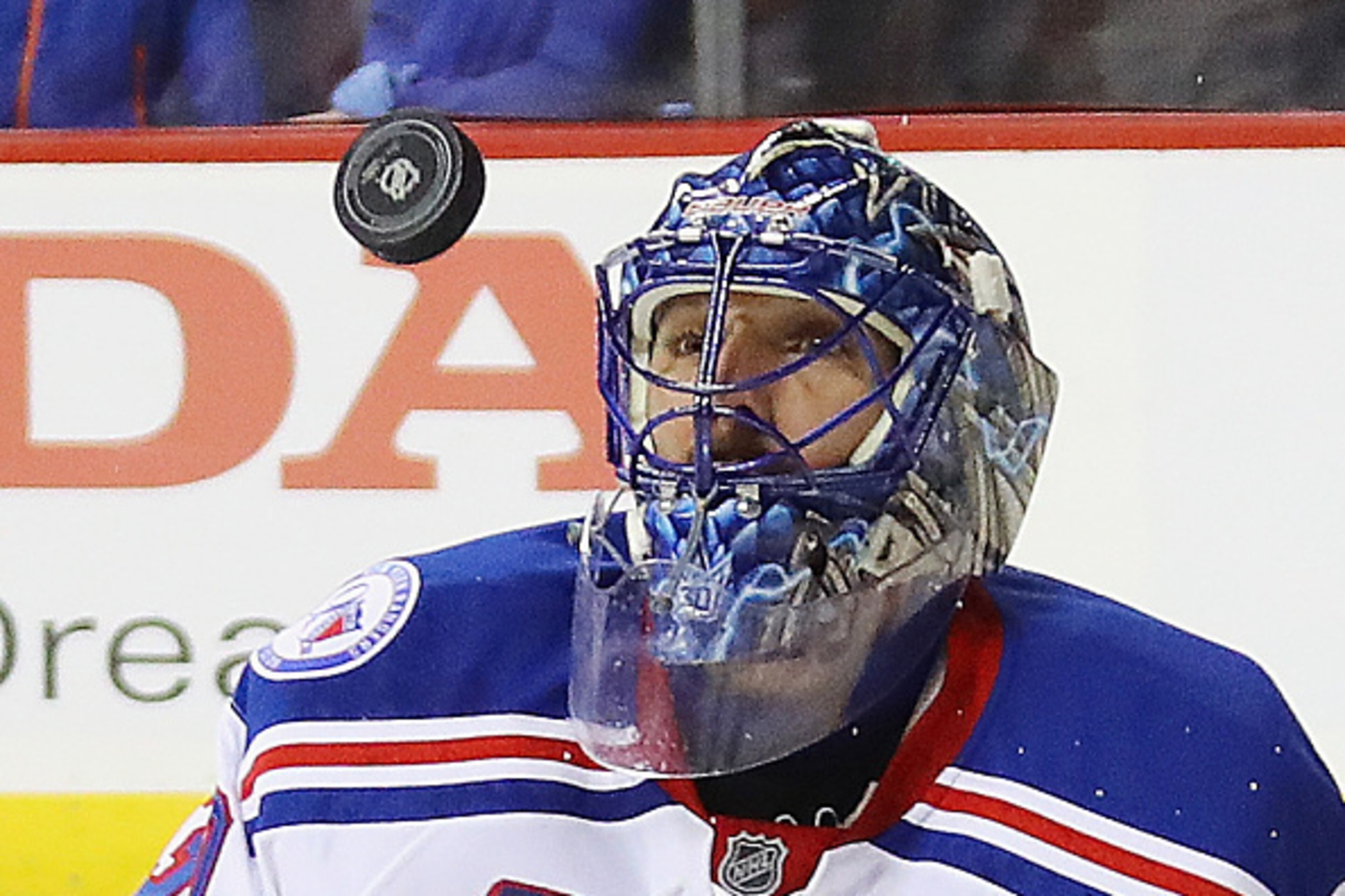 NEW YORK, NY - DECEMBER 06:  Henrik Lundqvist #30 of the New York Rangers keeps his eyes on the puck during the second period against the New York Islanders at the Barclays Center on December 6, 2016 in the Brooklyn borough of New York City.  (Photo by Br