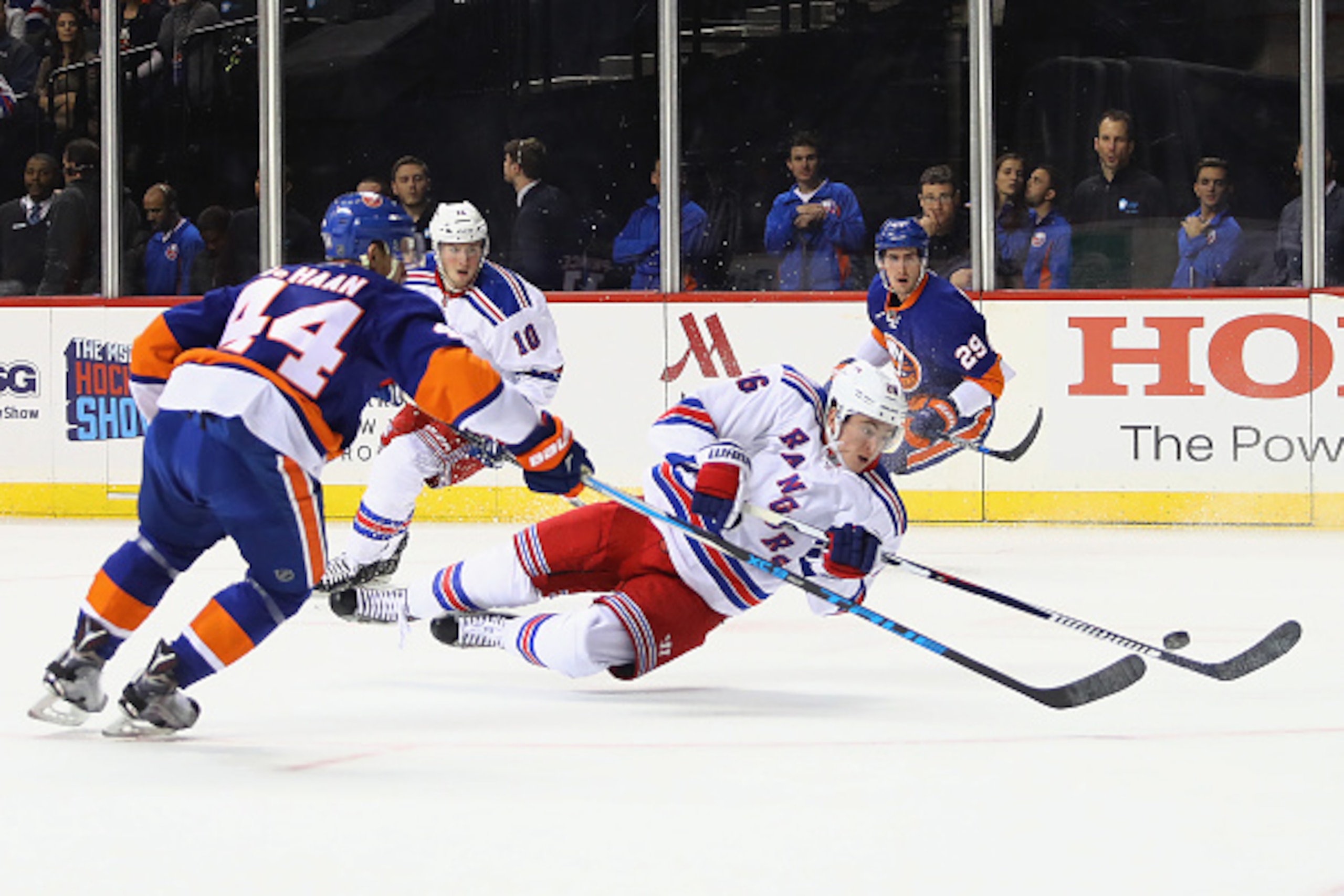 NEW YORK, NY - DECEMBER 06: Jimmy Vesey #26 of the New York Rangers gets the first period shot off against the New York Islanders at the Barclays Center on December 6, 2016 in the Brooklyn borough of New York City.  (Photo by Bruce Bennett/Getty Images)