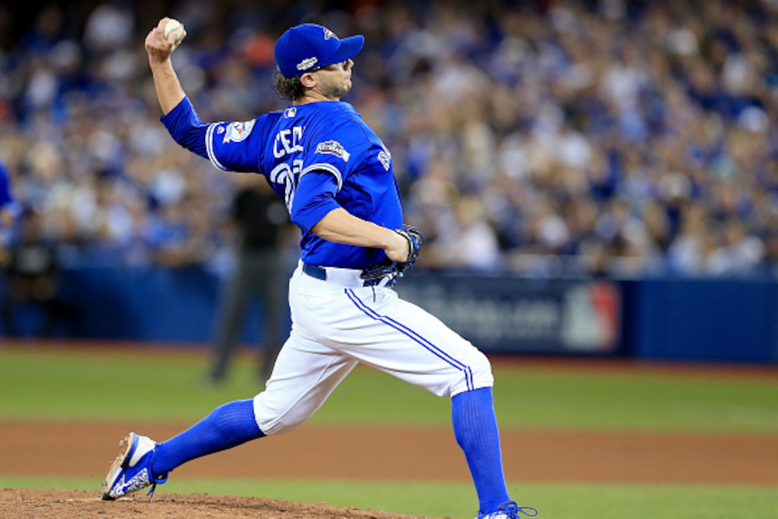 TORONTO, ON - OCTOBER 19: Brett Cecil #27 of the Toronto Blue Jays throws a pitch in the seventh inning against the Cleveland Indians during game five of the American League Championship Series at Rogers Centre on October 19, 2016 in Toronto, Canada. (P TORONTO, ON - OCTOBER 19: Brett Cecil #27 of the Toronto Blue Jays throws a pitch in the seventh inning against the Cleveland Indians during game five of the American League Championship Series at Rogers Centre on October 19, 2016 in Toronto, Canada. (P