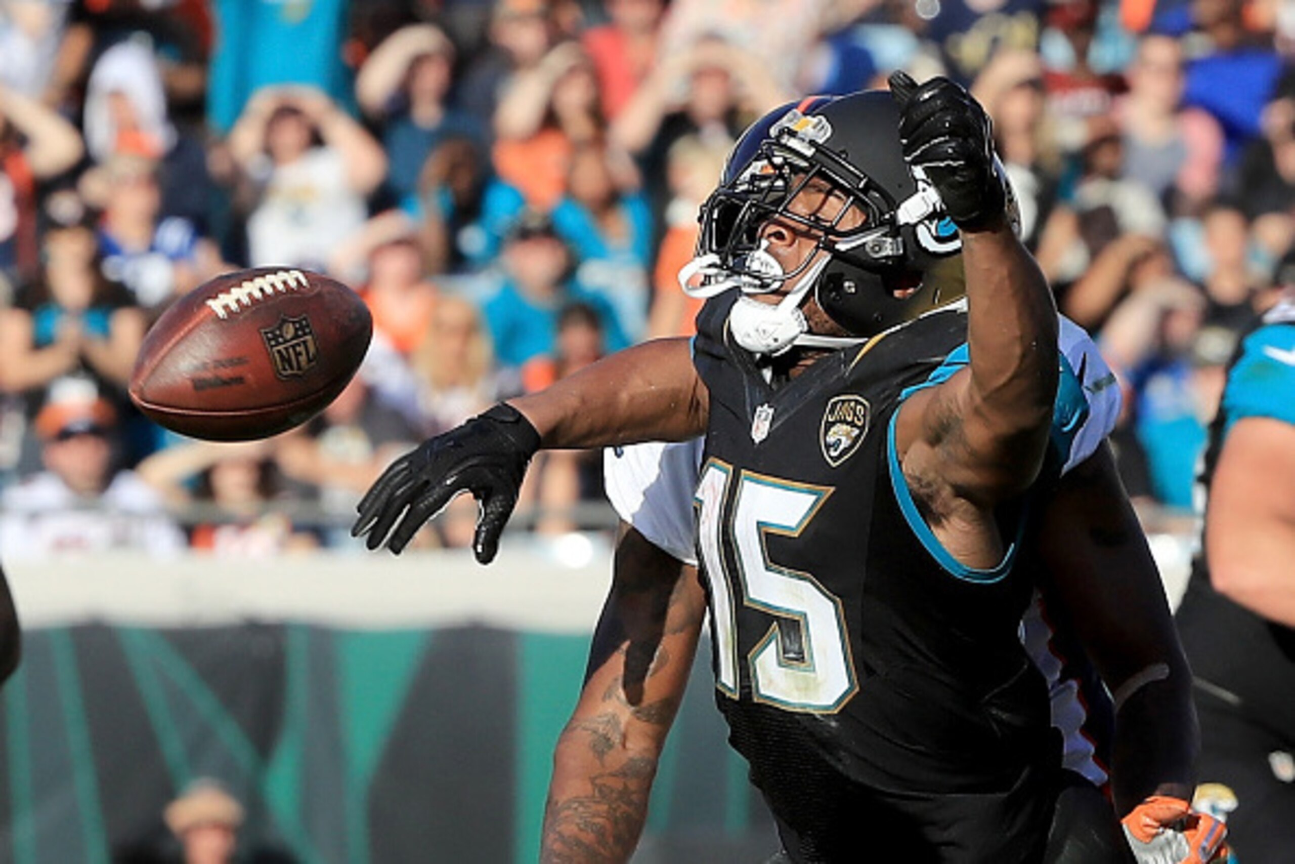JACKSONVILLE, FL - DECEMBER 04:   Allen Robinson #15 of the Jacksonville Jaguars attempts to catch a pass against the Denver Broncos at EverBank Field on December 4, 2016 in Jacksonville, Florida.  (Photo by Sam Greenwood/Getty Images)