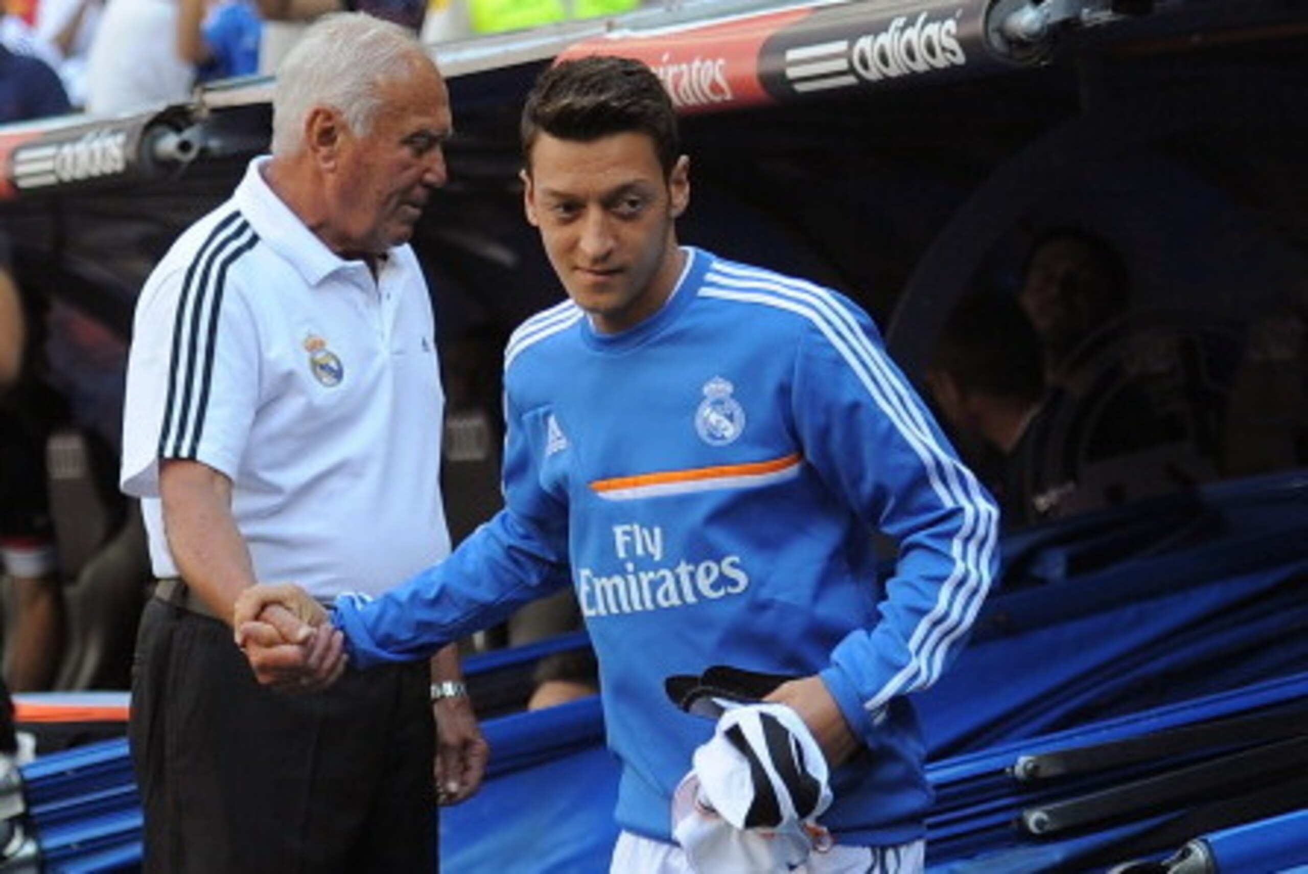 MADRID, SPAIN - SEPTEMBER 01:  Mesut Ozil of Real Madrid takes to the substitutes dug-out during the La Liga match between Real Madrid CF and Athletic Club Bilbao at estadio Santiago Bernabeu on September 1, 2013 in Madrid, Spain.  (Photo by Denis Doyle/G
