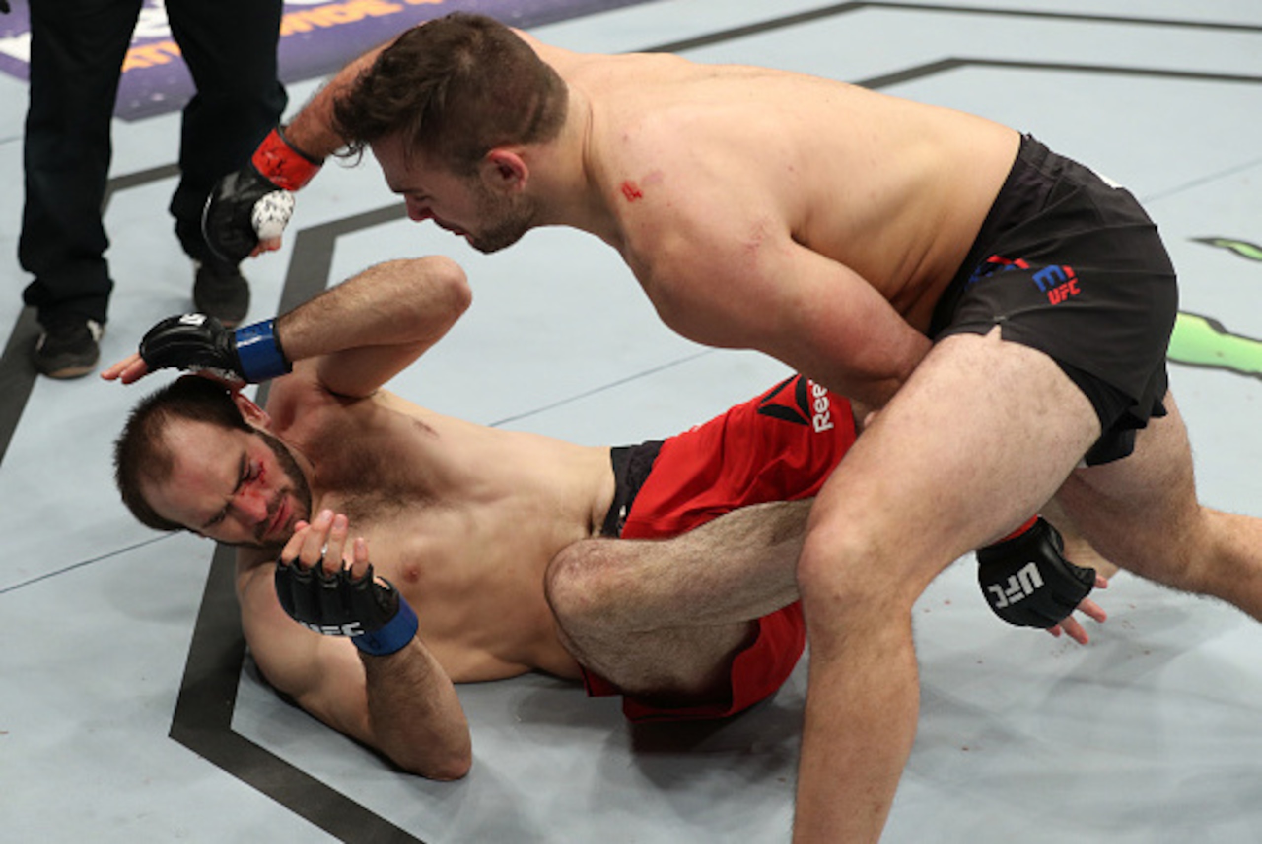 ALBANY, NY - DECEMBER 09: (R-L) Gian Villante punches Saparbek Safarov of Russia in their light heavyweight bout during the UFC Fight Night event at the Times Union Center on December 9, 2016 in Albany, New York. (Photo by Patrick Smith/Zuffa LLC/Zuffa LL