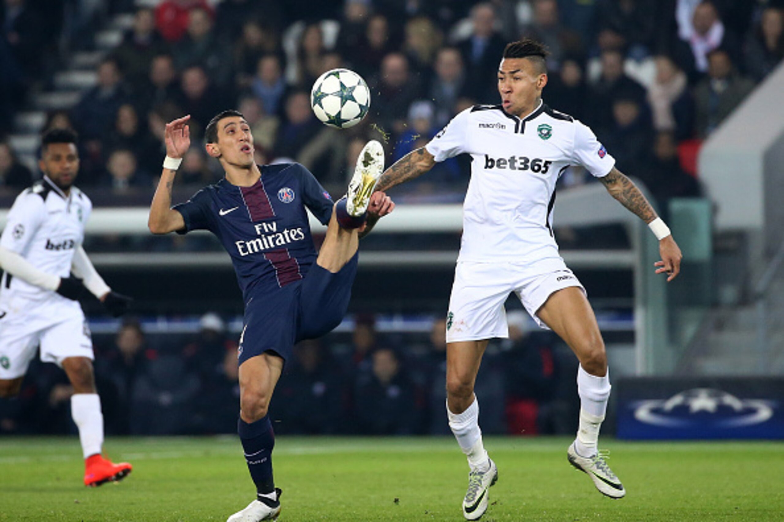 PARIS, FRANCE - DECEMBER 6: Angel Di Maria of PSG and Marcelinho of Ludogorets in action during the UEFA Champions League match between Paris Saint-Germain (PSG) and PFC Ludogorets Razgrad at Parc des Princes stadium on December 6, 2016 in Paris, France. 