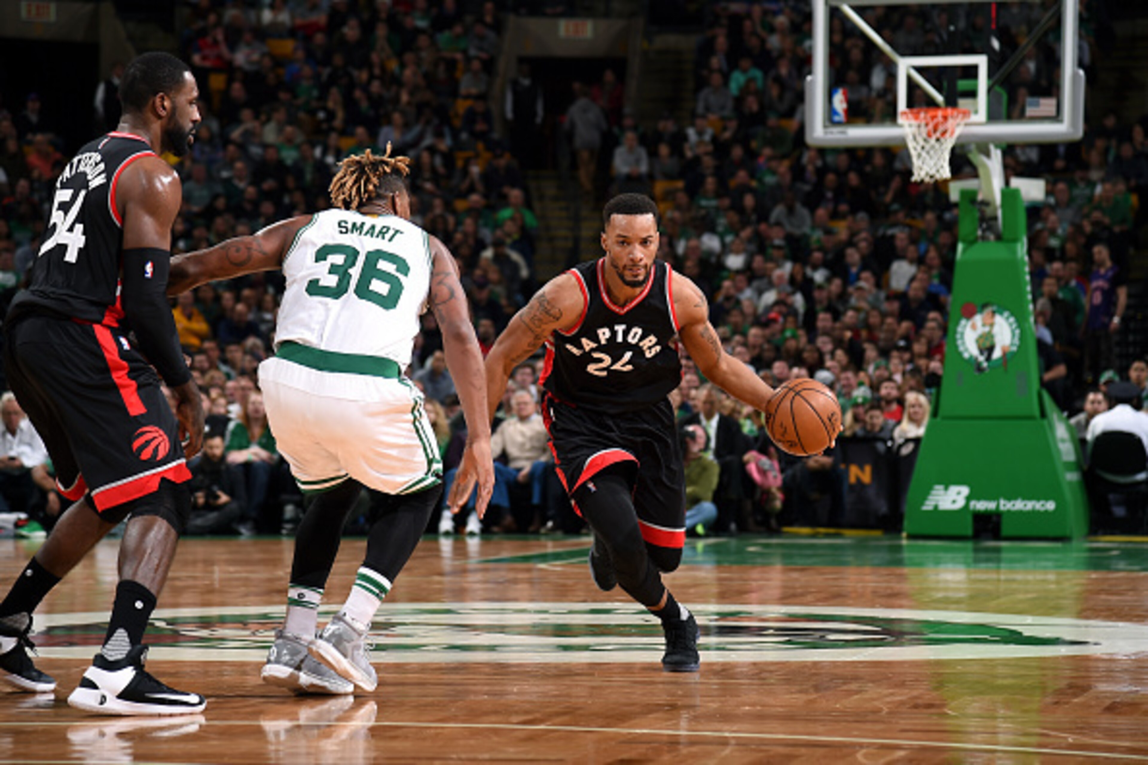 BOSTON, MA - DECEMBER 9: Norman Powell #24 of the Toronto Raptors handles the ball during the game against the Boston Celtics' on December 9, 2016 at TD Garden in Boston, Massachusetts. NOTE TO USER: User expressly acknowledges and agrees that, by downloa