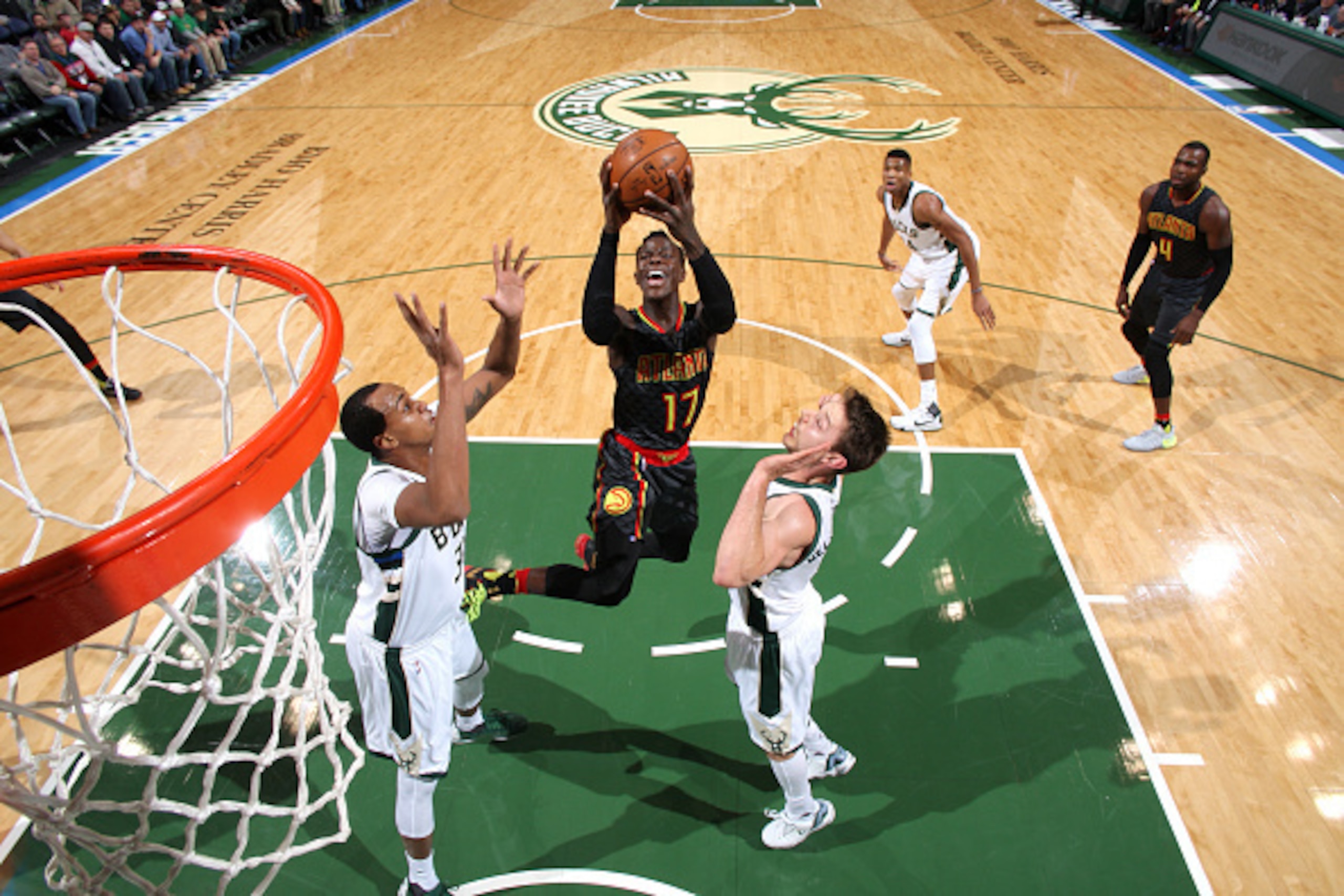 Milwaukee, WI - DECEMBER 9: Dennis Schroder #17 of the Atlanta Hawks shoots the ball during the game against the Milwaukee Bucks on December 9, 2016 at the BMO Harris Bradley Center in Milwaukee, Wisconsin. NOTE TO USER: User expressly acknowledges and ag