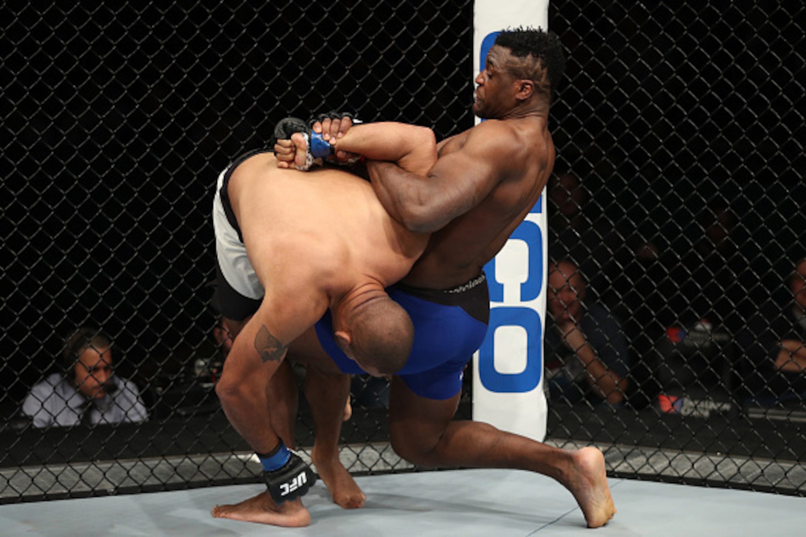 ALBANY, NY - DECEMBER 09:  (R-L) Francis Ngannou of Cameroon secures a kimura submission against Anthony Hamilton in their heavyweight bout during the UFC Fight Night event at the Times Union Center on December 9, 2016 in Albany, New York. (Photo by Patri