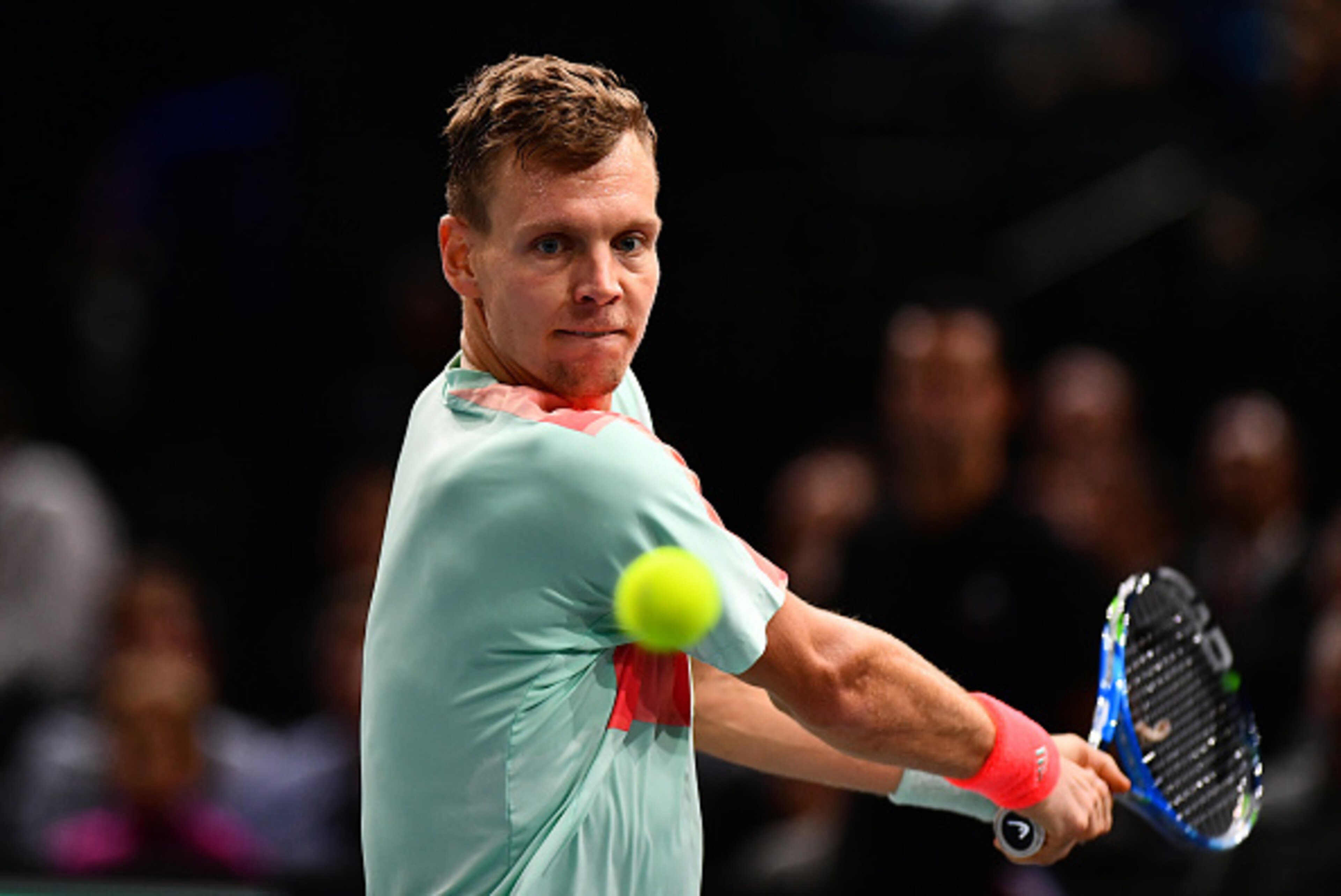 PARIS, FRANCE - NOVEMBER 04:  Tomas Berdych of the Czech Republic plays a backhand against Andy Murray of Great Britain during the Mens Singles quarter final match on day five of the BNP Paribas Masters at Palais Omnisports de Bercy on November 4, 2016 in