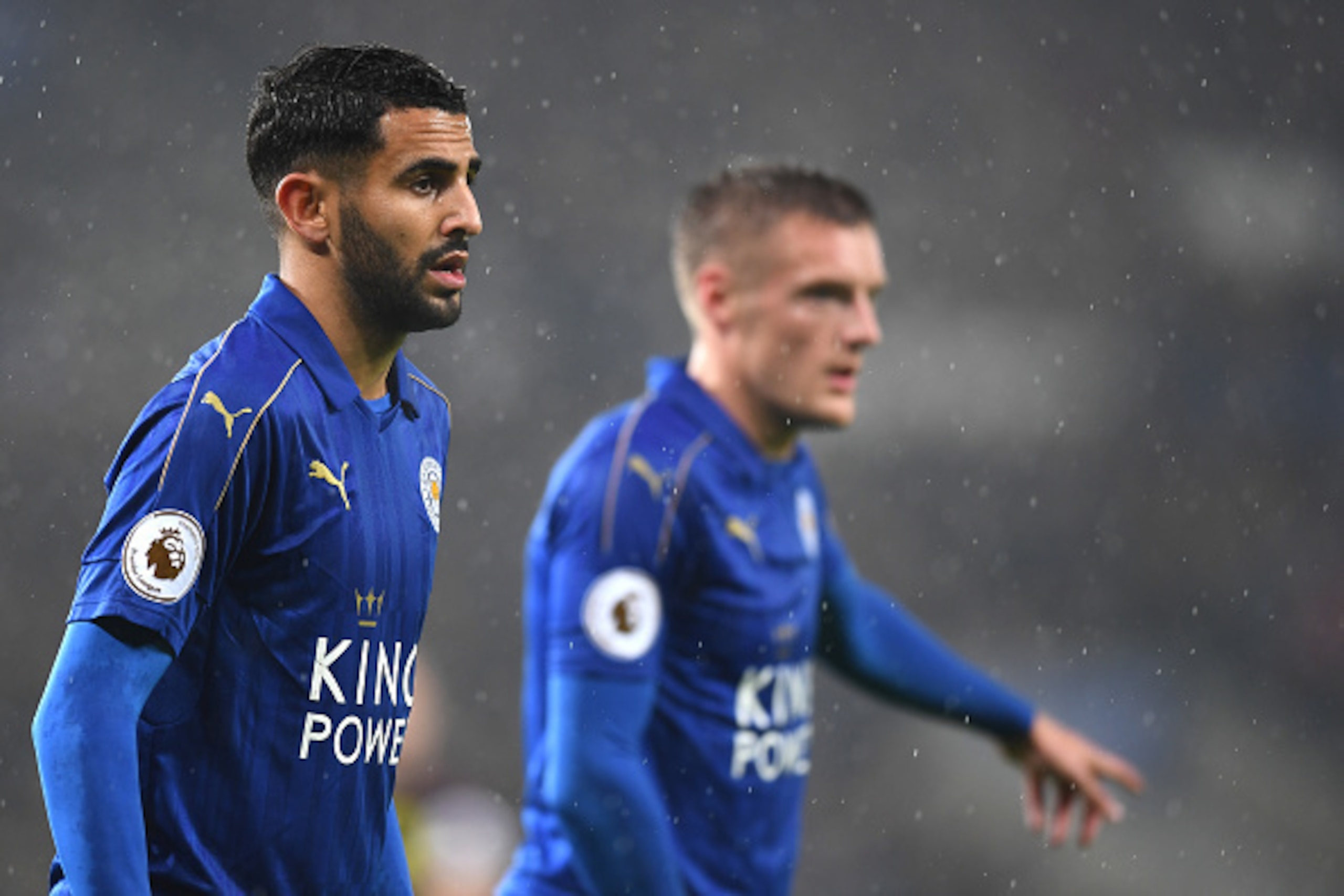 LEICESTER, ENGLAND - DECEMBER 10: Riyad Mahrez of Leicester City (L) looks on during the Premier League match between Leicester City and Manchester City at the King Power Stadium on December 10, 2016 in Leicester, England.  (Photo by Michael Regan/Getty I