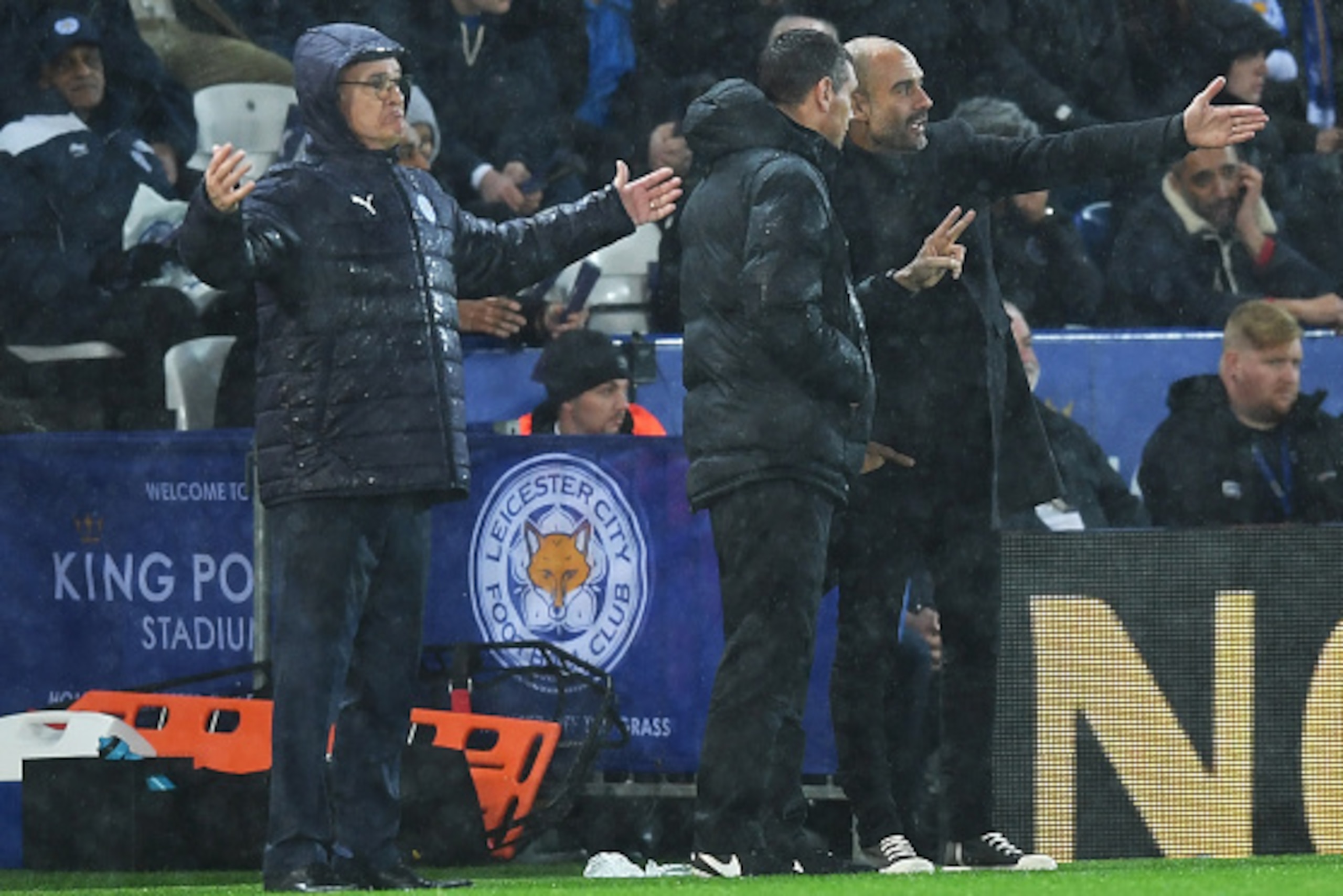 LEICESTER, ENGLAND - DECEMBER 10: Claudio Ranieri, Manager of Leicester City (L) reacts during the Premier League match between Leicester City and Manchester City at the King Power Stadium on December 10, 2016 in Leicester, England.  (Photo by Michael Reg