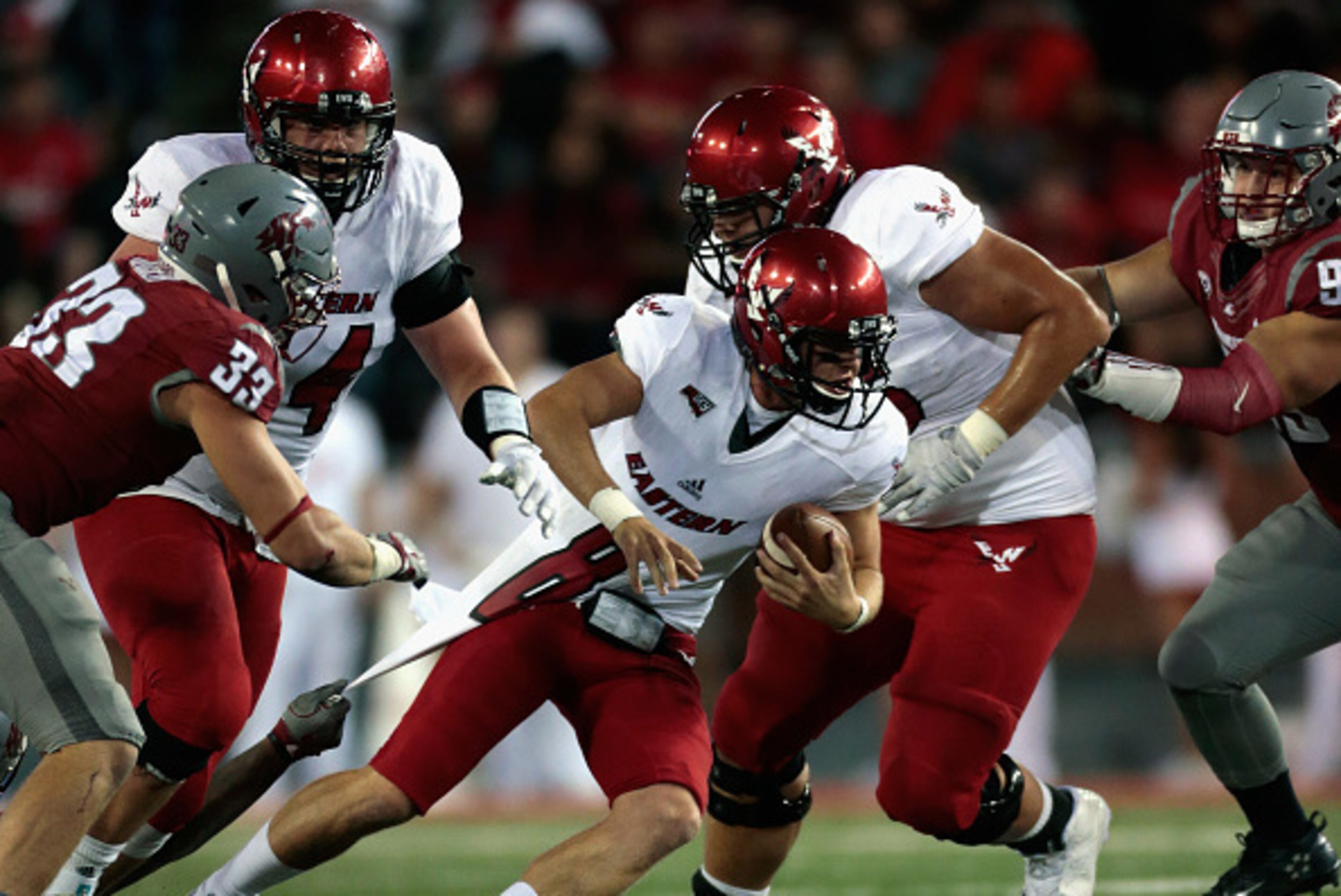 PULLMAN, WA - SEPTEMBER 03:  Quarterback Gage Gubrud #8 of the Eastern Washington Eagles moves the ball against the Washington State Cougars in the second half at Martin Stadium on September 3, 2016 in Pullman, Washington.  Eastern Washington defeated Was