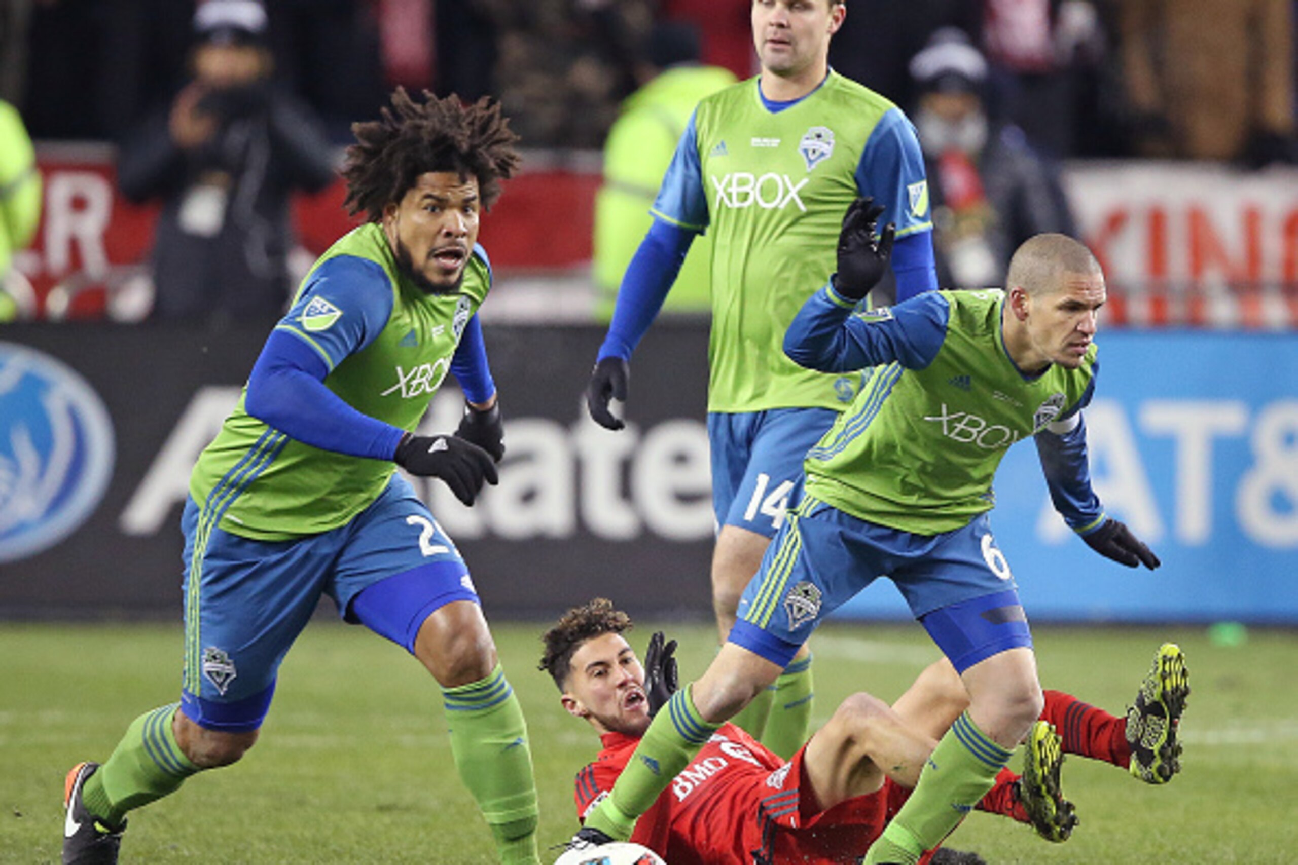 TORONTO, ONTARIO - DECEMBER 10:  Roman Torres #29 and Osvaldo Alonso #6 of the Seattle Sounders break away against the Toronto FC during the 2016 MLS Cup at BMO Field on December 10, 2016 in Toronto, Ontario, Canada. Seattle defeated Toronto in the 6th ro
