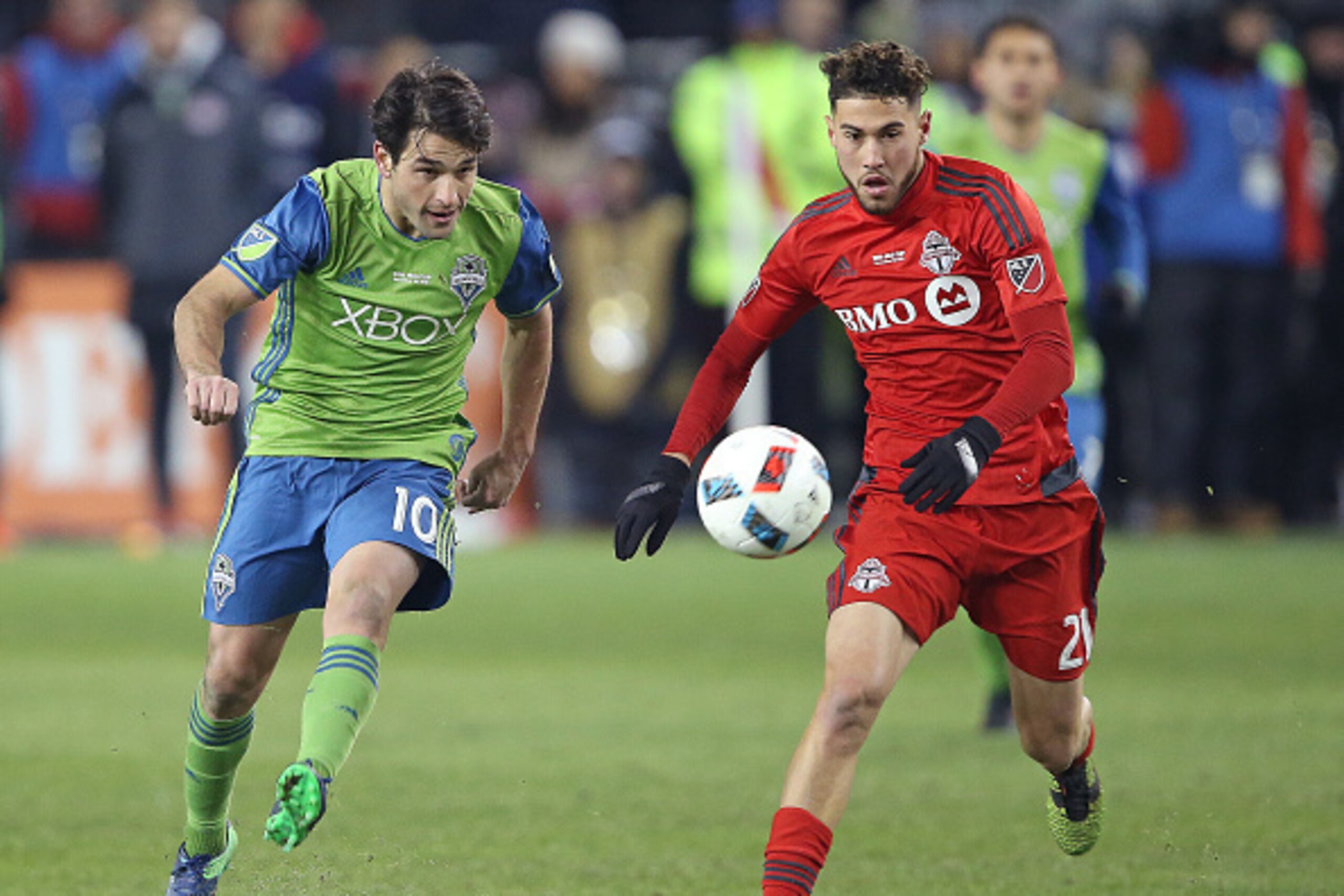TORONTO, ONTARIO - DECEMBER 10:  Nicolas Lodeiro #10 of the Seattle Sounders plays against Jonathan Osorio #21 of the Toronto FC during the 2016 MLS Cup at BMO Field on December 10, 2016 in Toronto, Ontario, Canada. Seattle defeated Toronto in the 6th rou